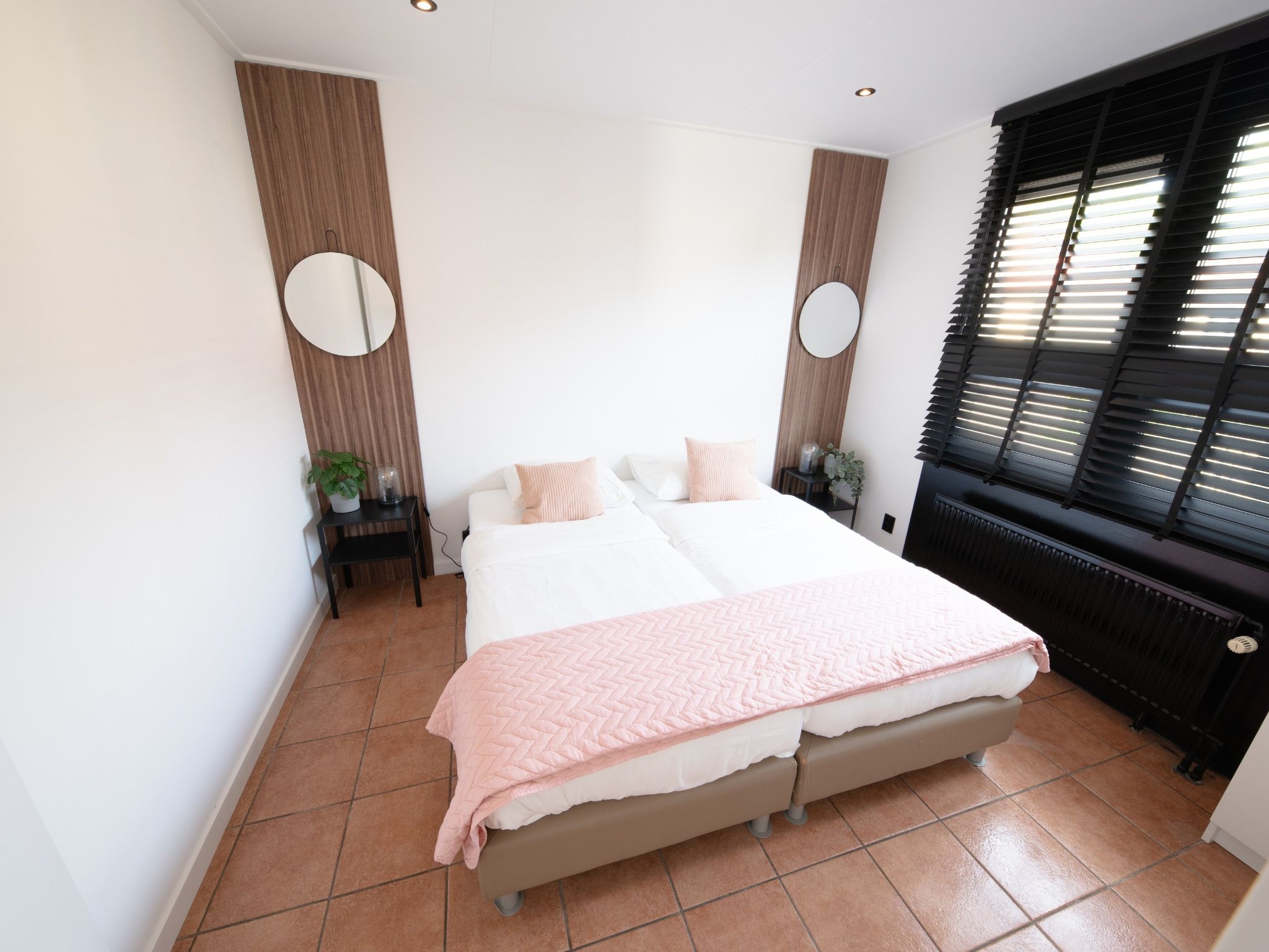 Een slaapkamer van Comfort bungalow – Max 6 personen – nummer 56 in Zevenhuizen