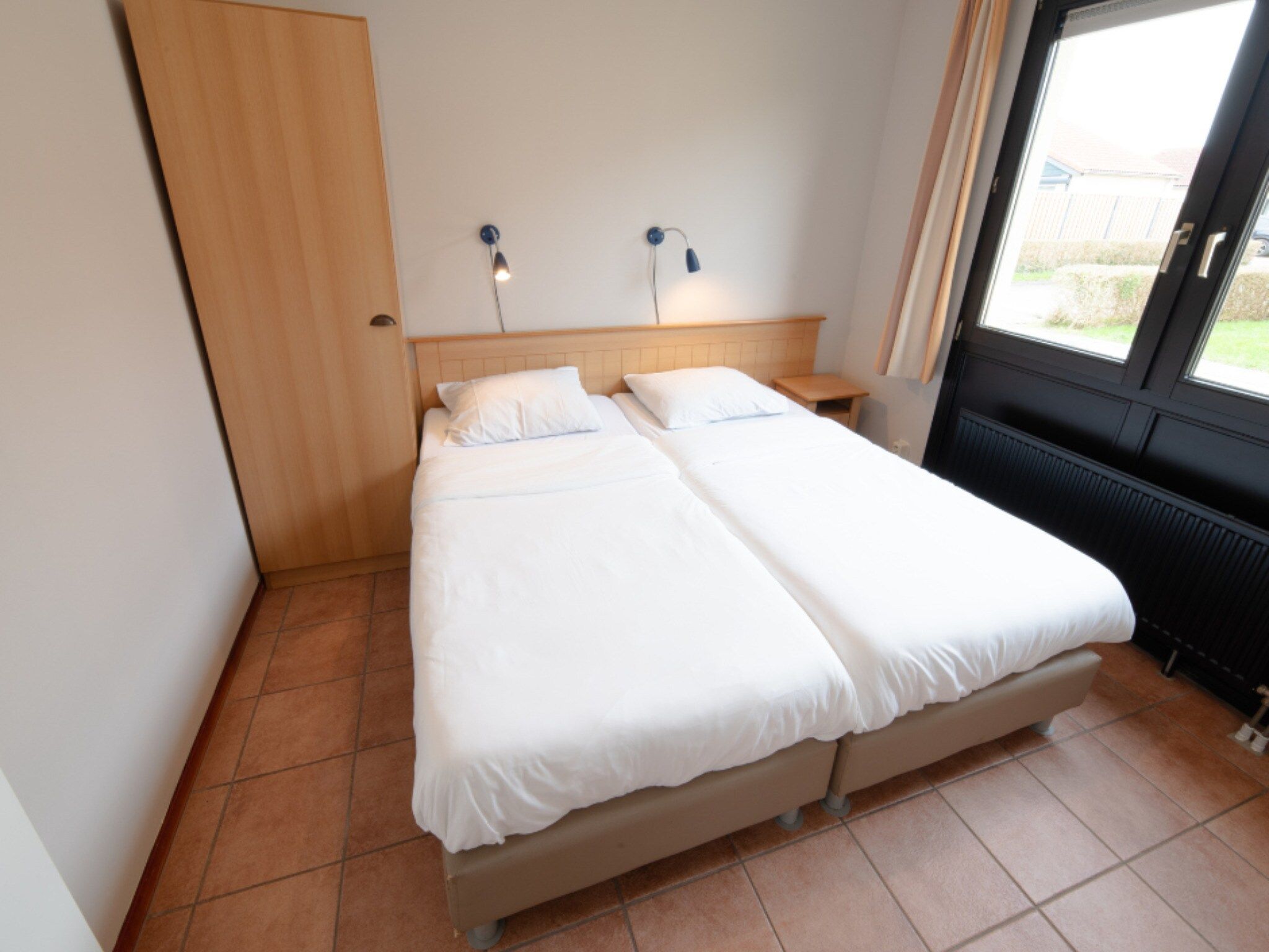 Een slaapkamer van Premium bungalow – max 6 personen – Nummer 109 in Zevenhuizen