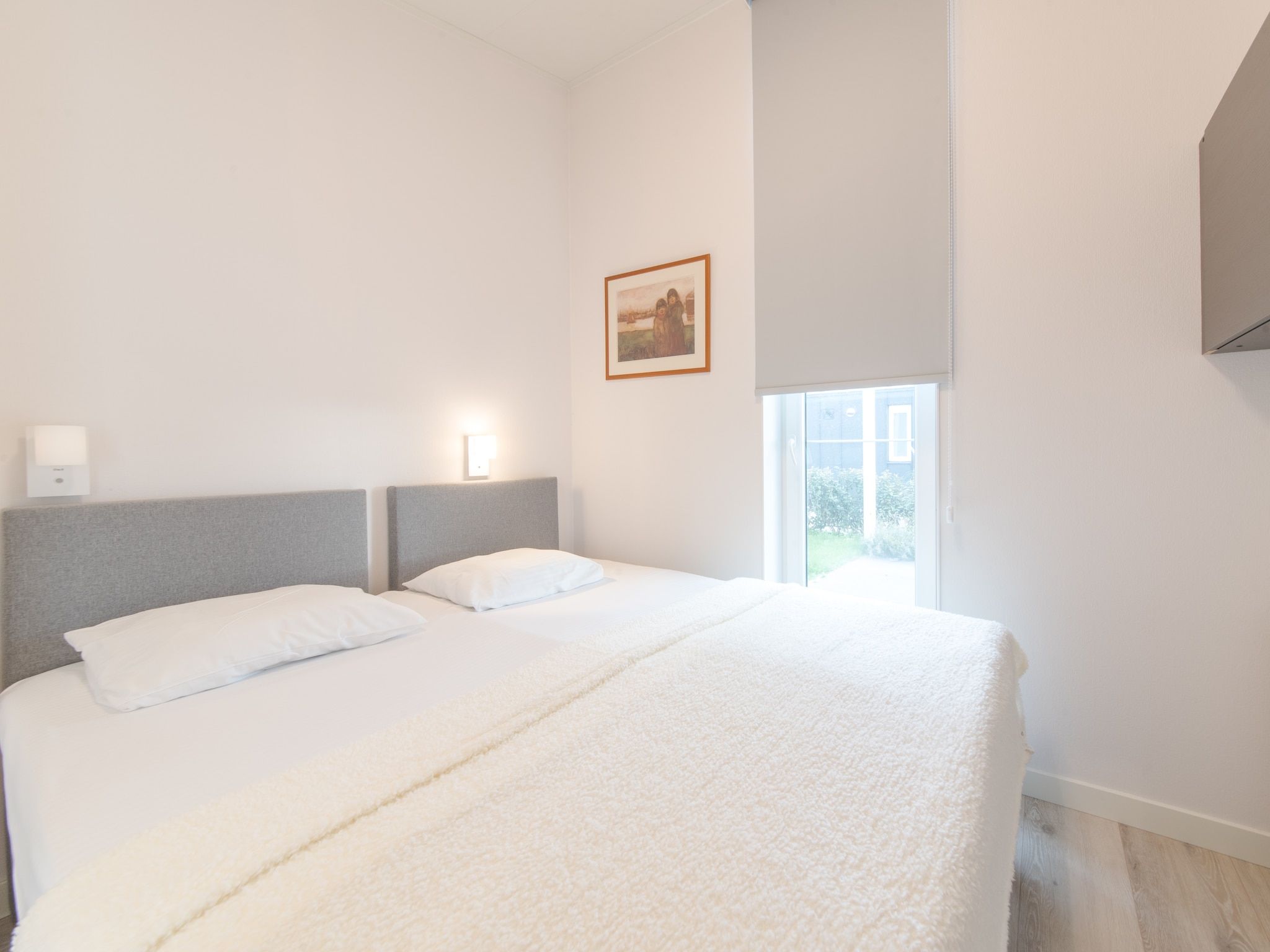 Een slaapkamer van Water Resort Oosterschelde 47A in Wemeldinge