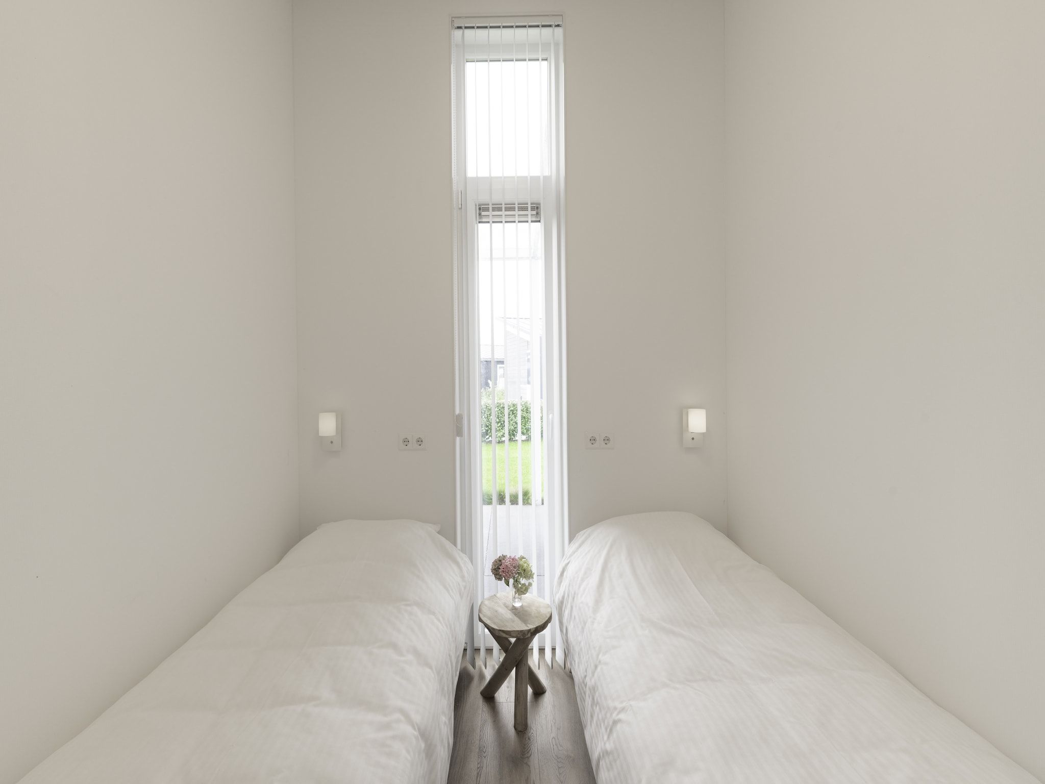 Een slaapkamer van Water Resort Oosterschelde 55 in Wemeldinge