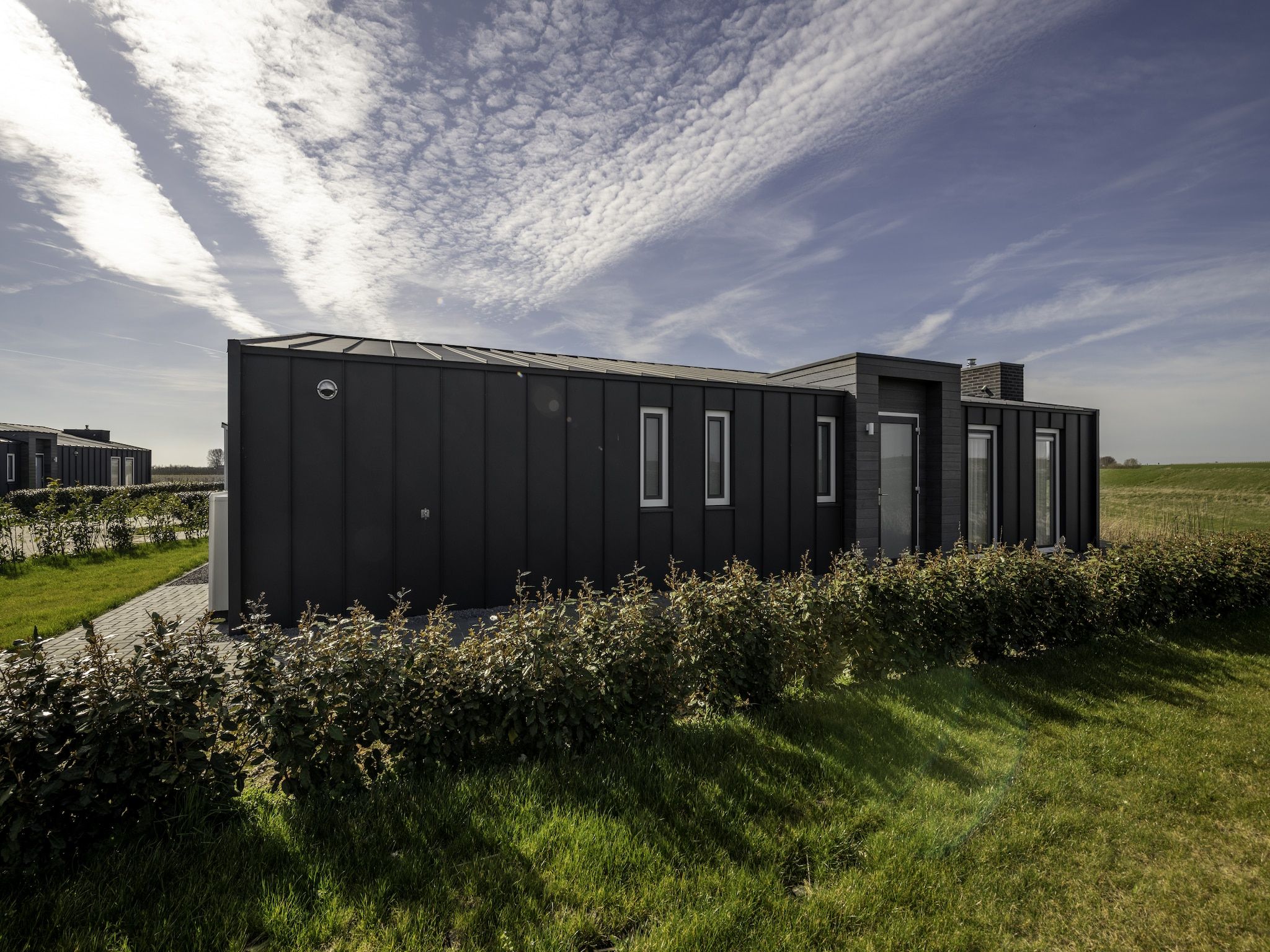 De buitenkant van Water Resort Oosterschelde 55 in Wemeldinge