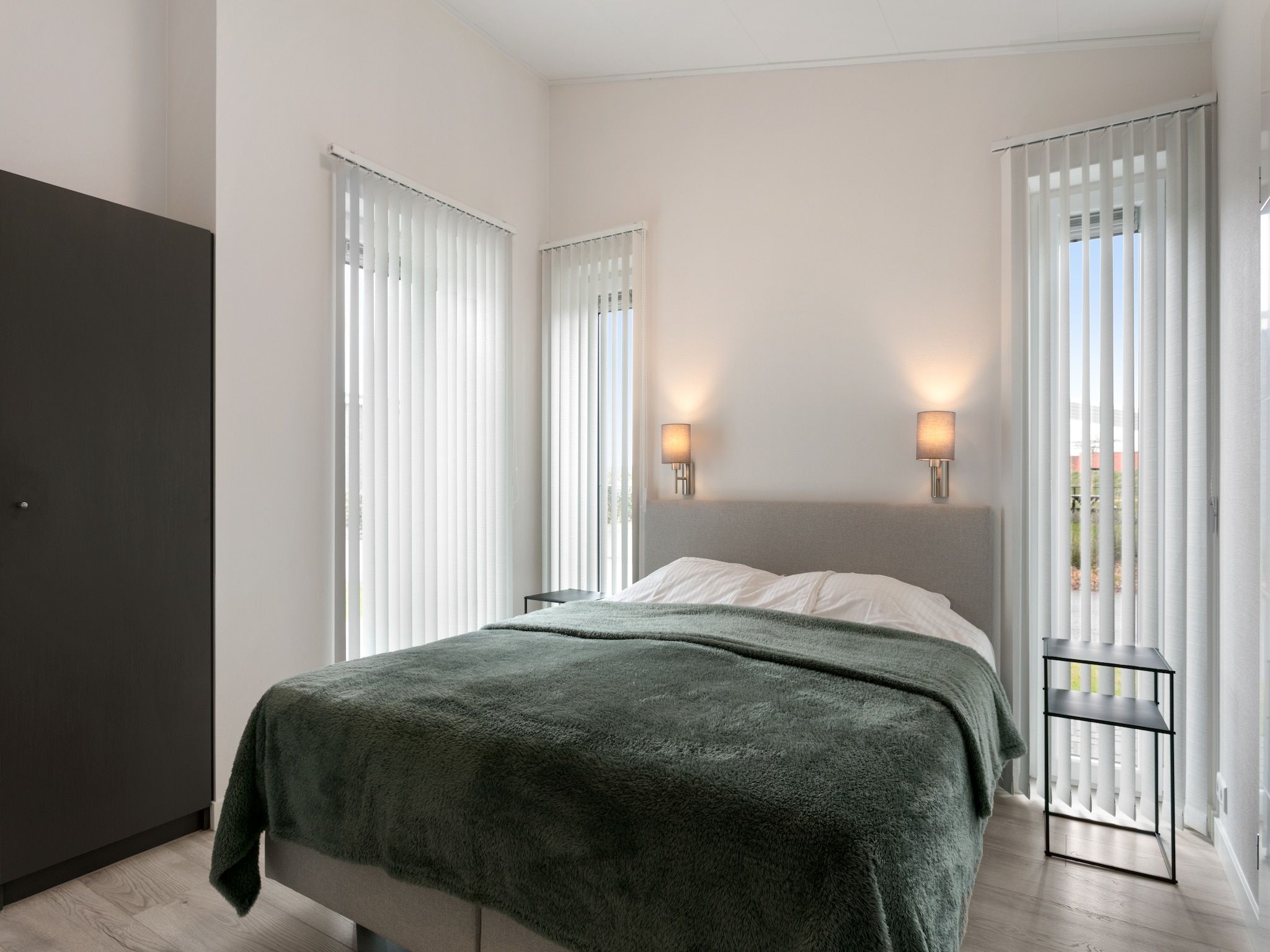 Een slaapkamer van Water Resort Oosterschelde 56 in Wemeldinge