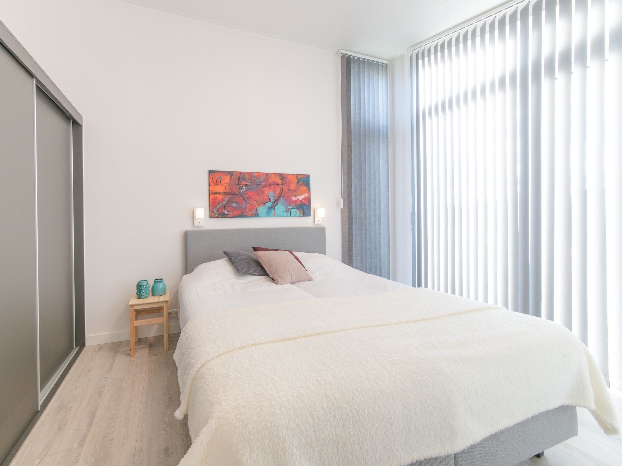 Een slaapkamer van Water Resort Oosterschelde 59 in Wemeldinge