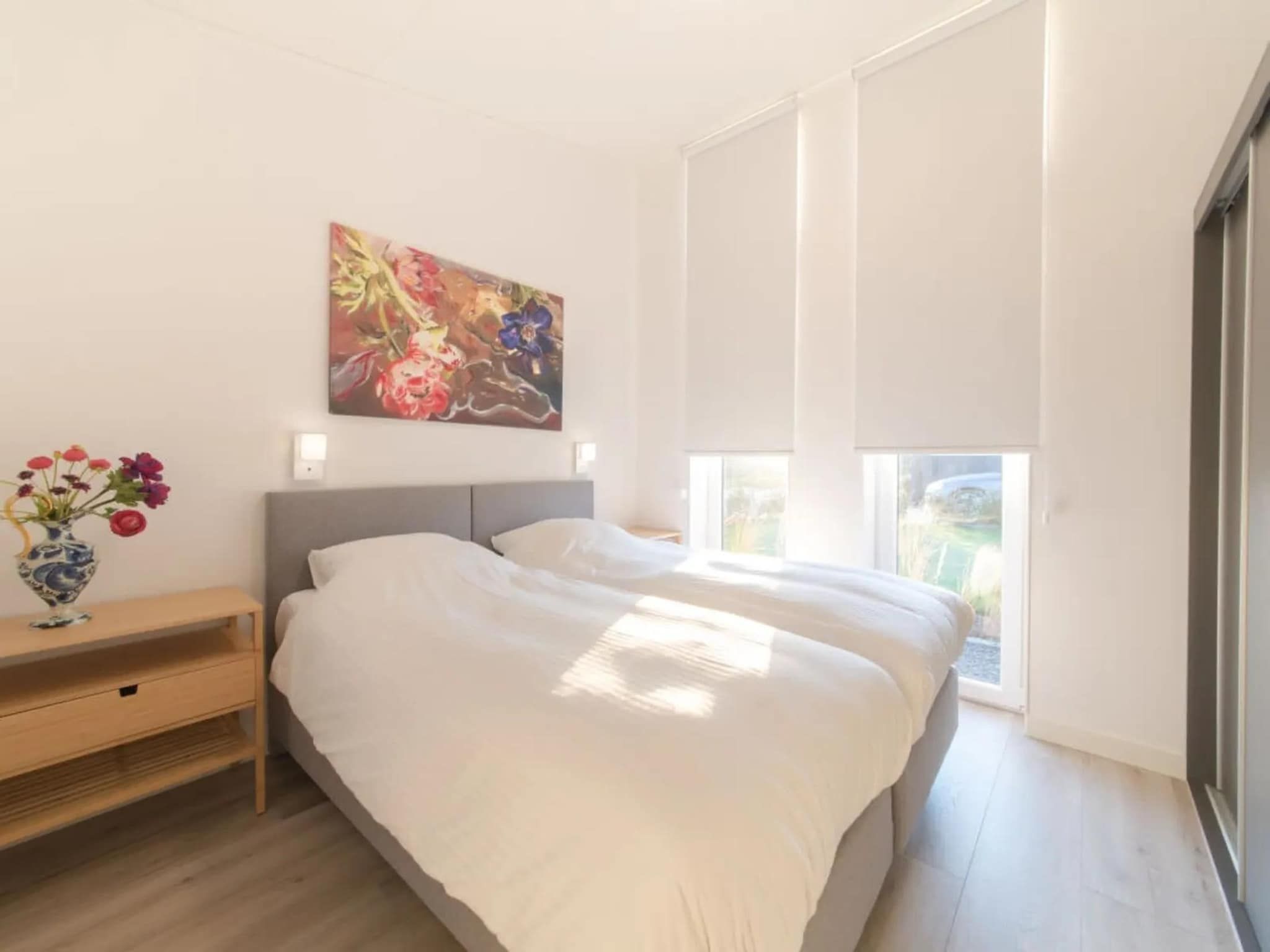 Een slaapkamer van Water Resort Oosterschelde 73 in Wemeldinge