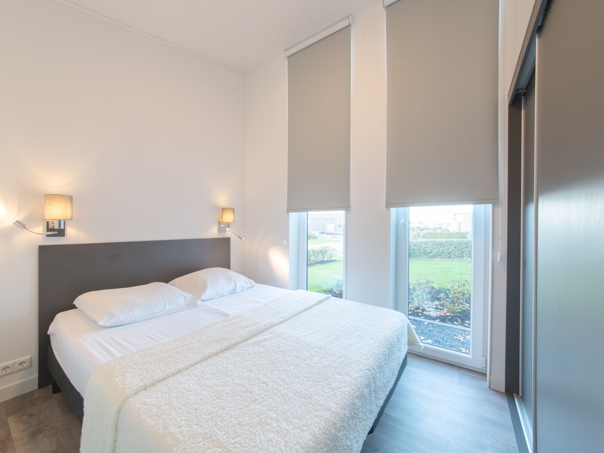 Een slaapkamer van Water Resort Oosterschelde 101 in Wemeldinge