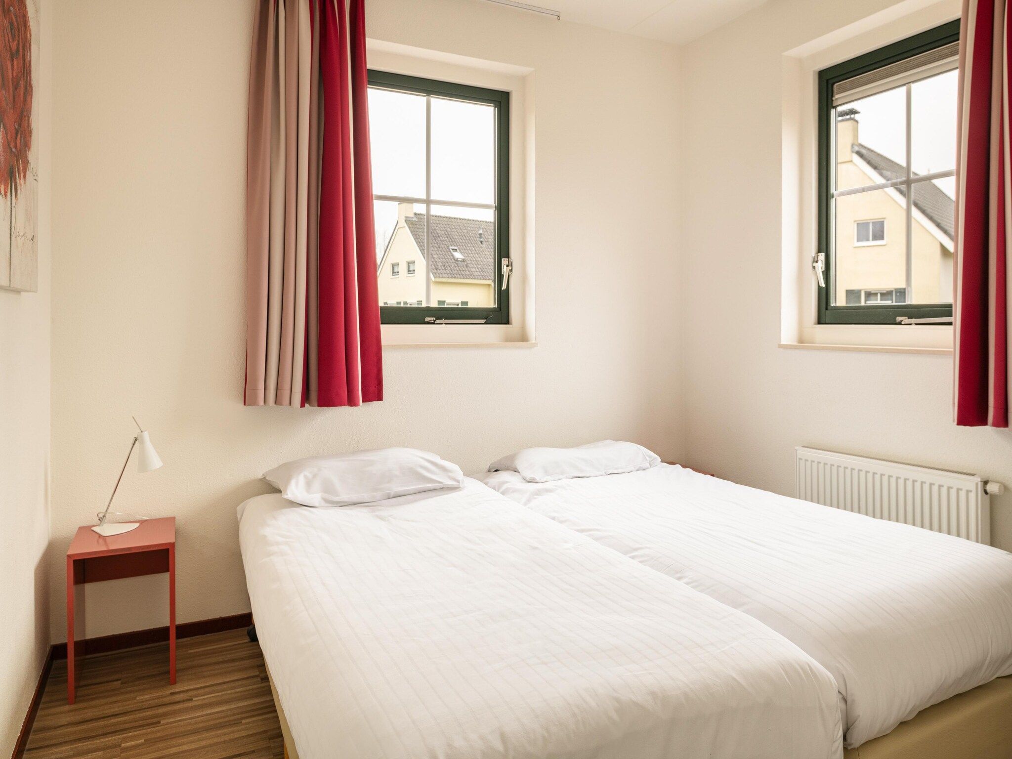 Een slaapkamer van Vakantiepark Emslandermeer 19 in Vlagtwedde