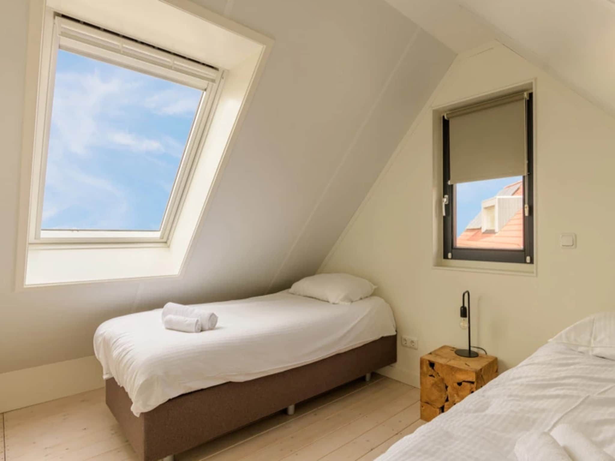 Een slaapkamer van Waterpark Langelille 3 in Langelille