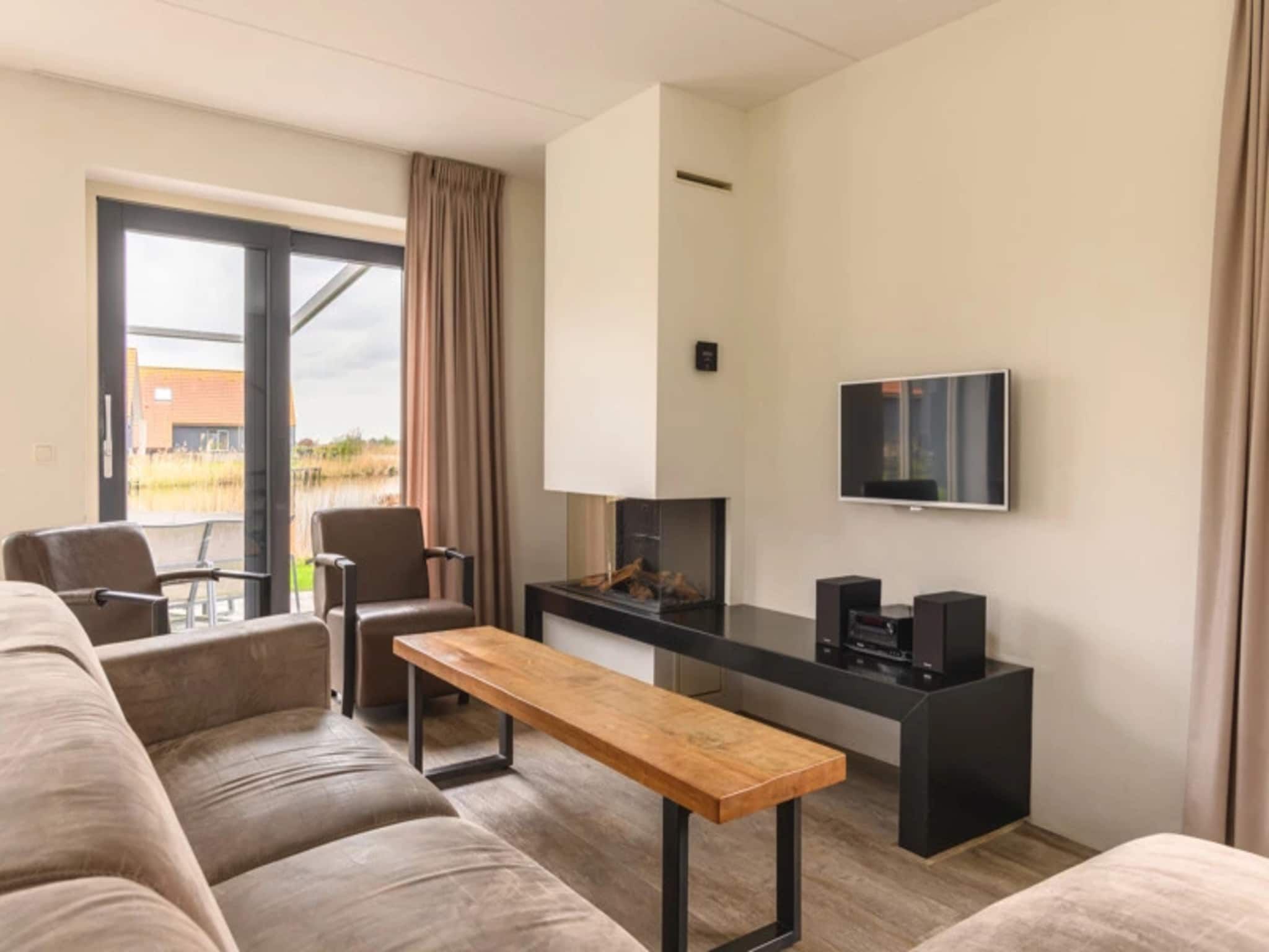 De woonkamer van Waterpark Langelille 4 in Langelille