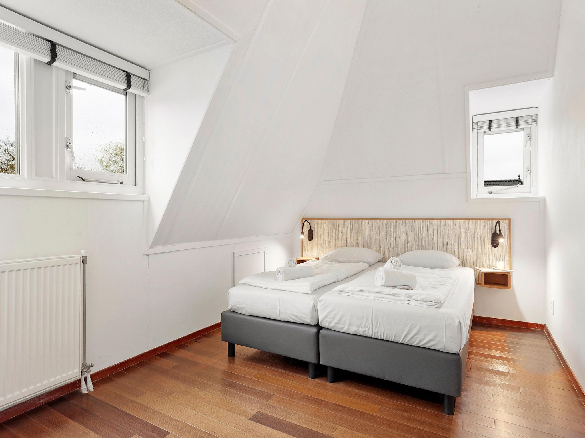 Een slaapkamer van Waterpark De Bloemert 9 in Midlaren