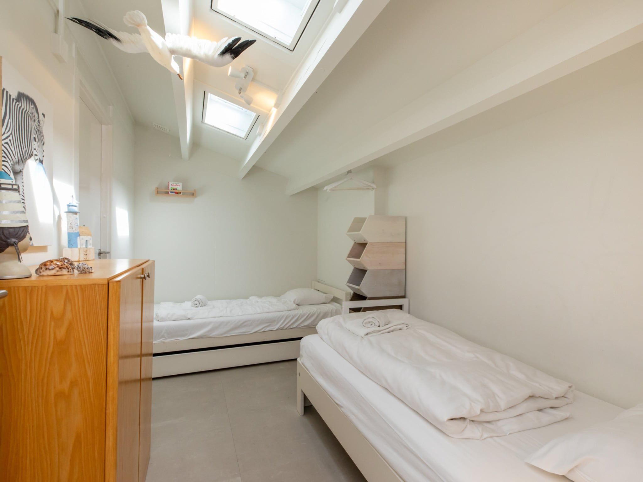 Een slaapkamer van Vakantiehuis - Lepelblad 97 in Nieuwvliet