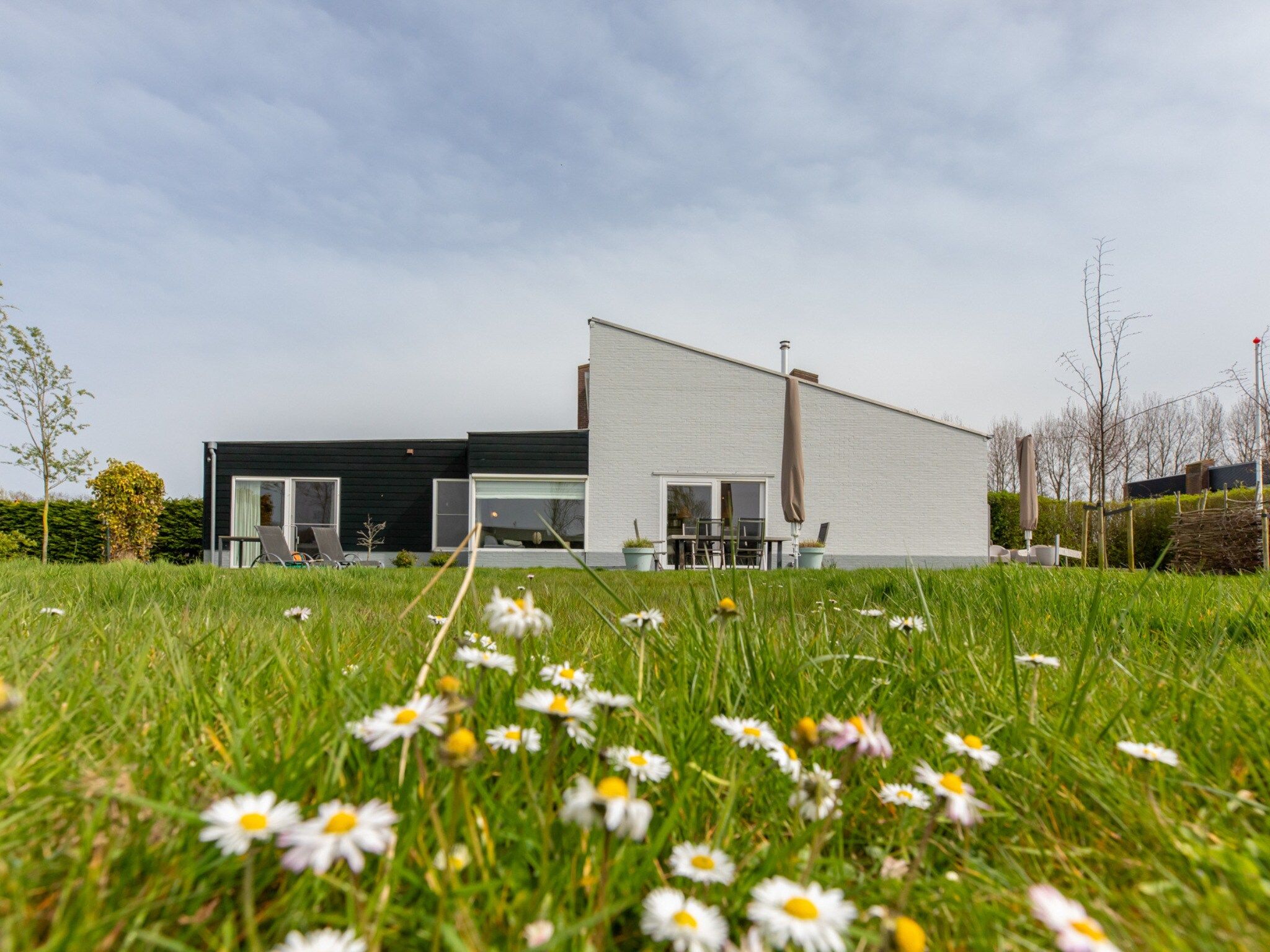 De tuin van Vakantiehuis - Lepelblad 97 in Nieuwvliet