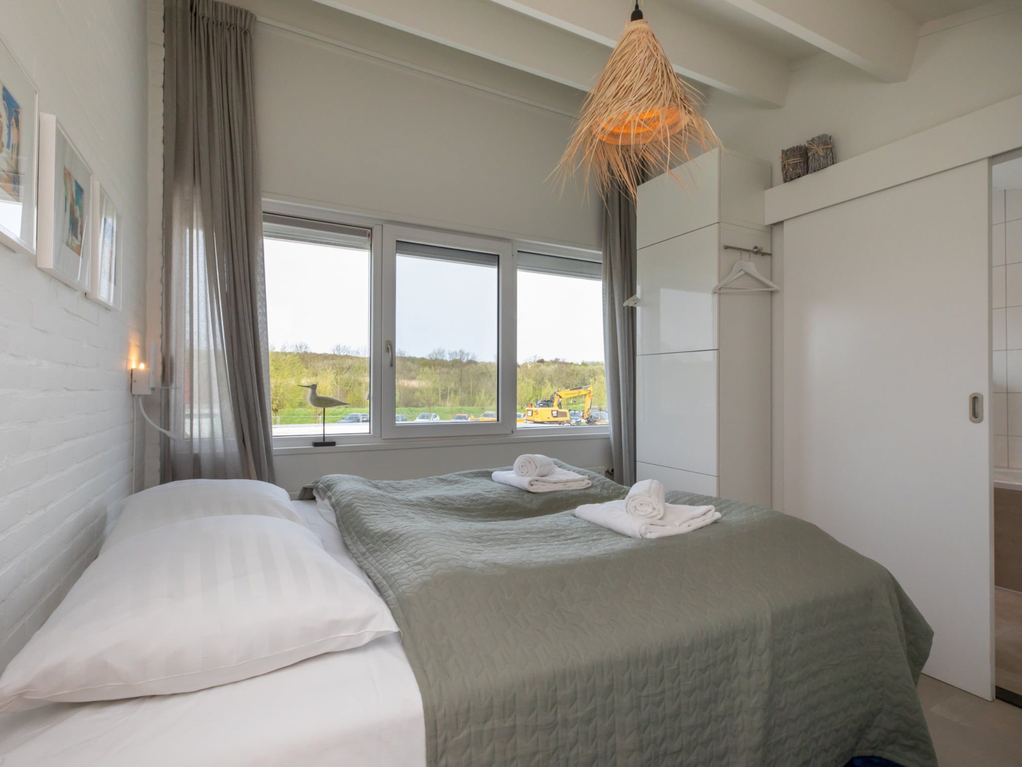 Een slaapkamer van Vakantiehuis - Lepelblad 97 in Nieuwvliet