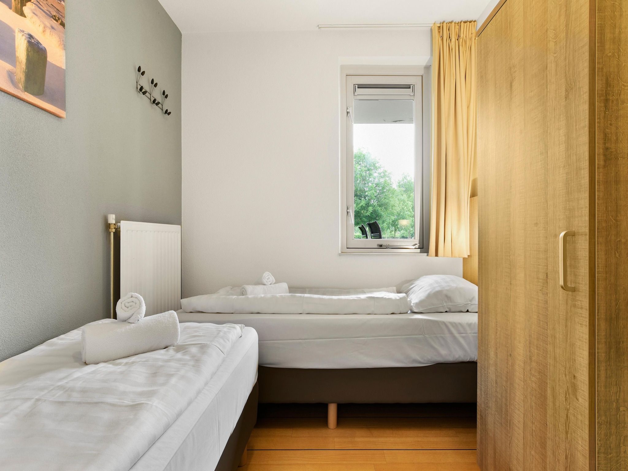 Een slaapkamer van Parc Port Greve 5 in Brouwershaven