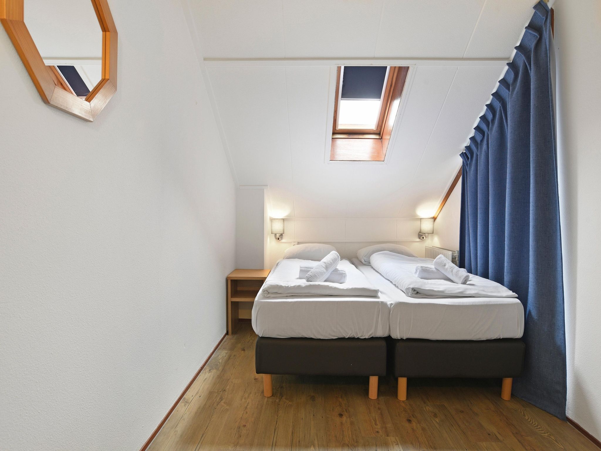 Een slaapkamer van Parc Port Greve 7 in Brouwershaven