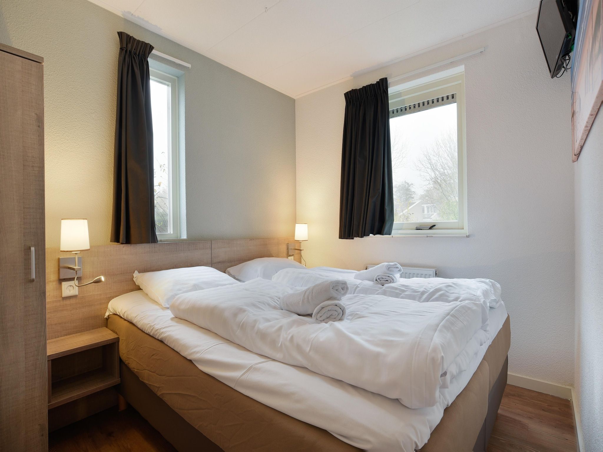 Een slaapkamer van Parc Port Greve 11 in Brouwershaven