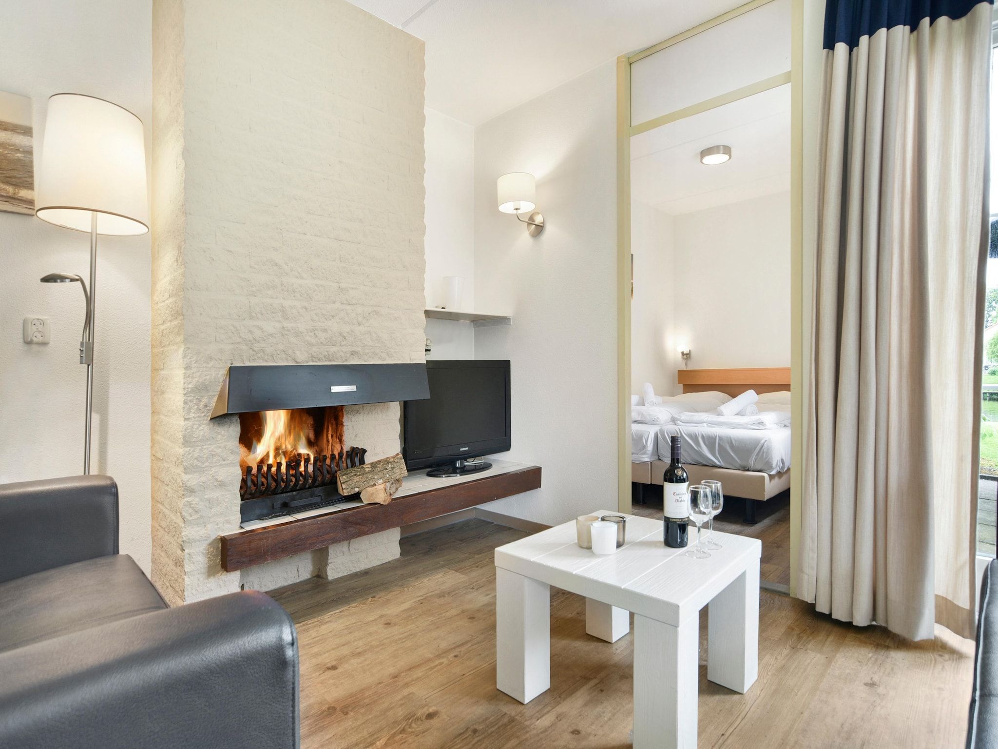 De woonkamer van Parc Port Greve 12 in Brouwershaven