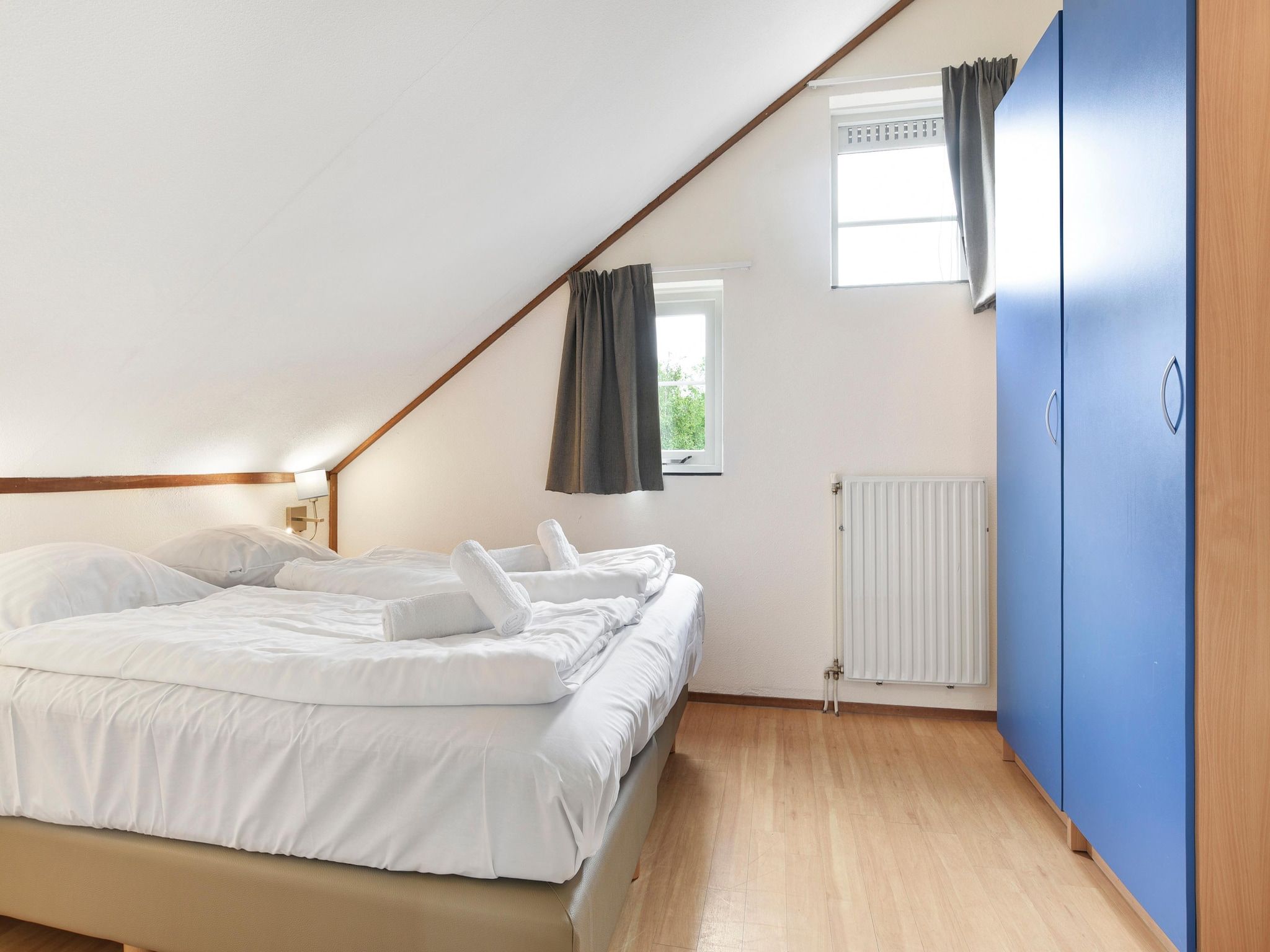 Een slaapkamer van Parc Port Greve 12 in Brouwershaven