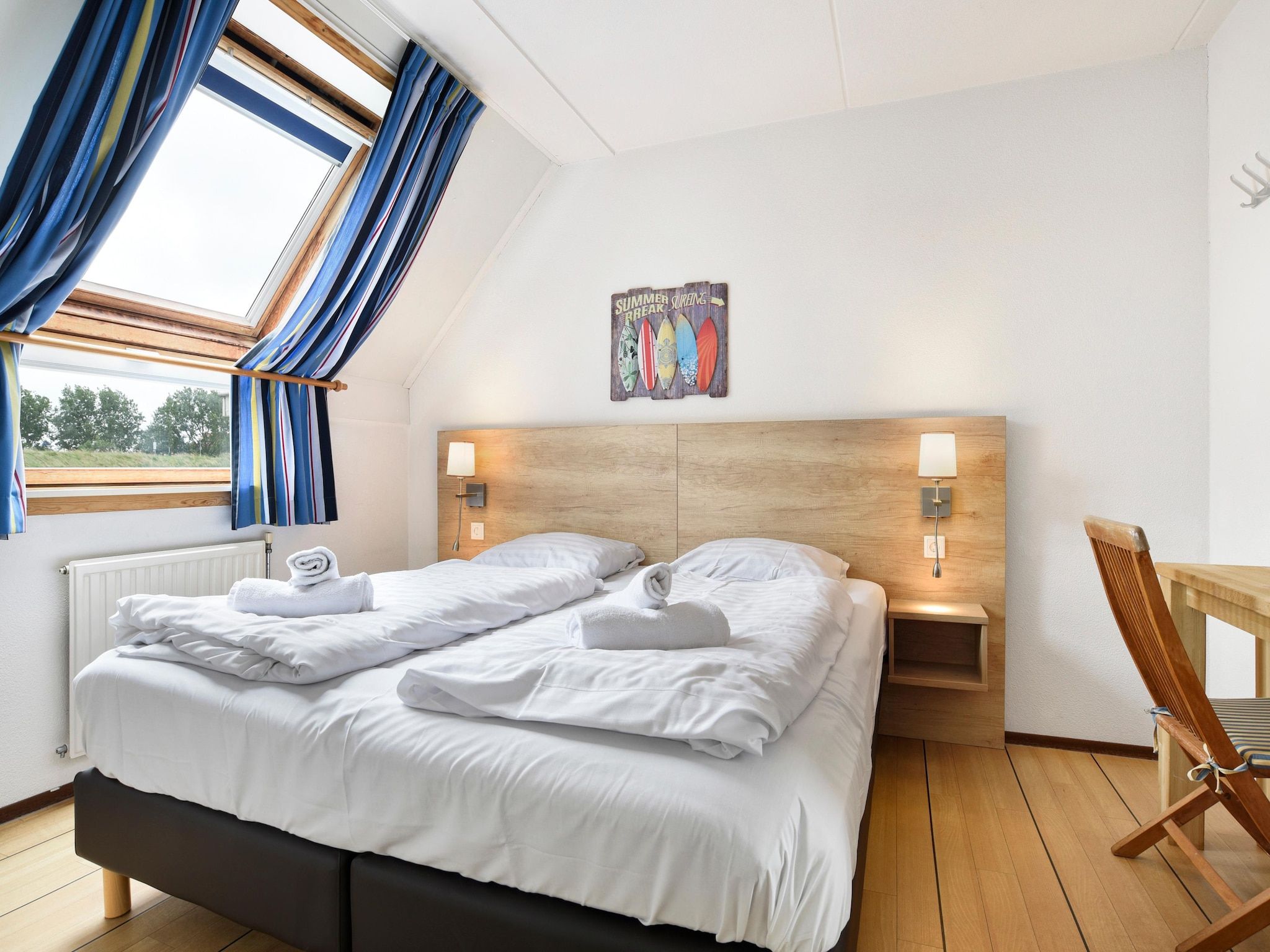 Een slaapkamer van Parc Port Greve 14 in Brouwershaven