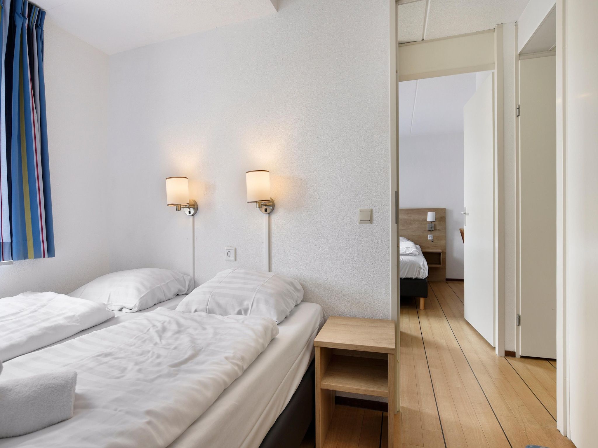 Een slaapkamer van Parc Port Greve 14 in Brouwershaven