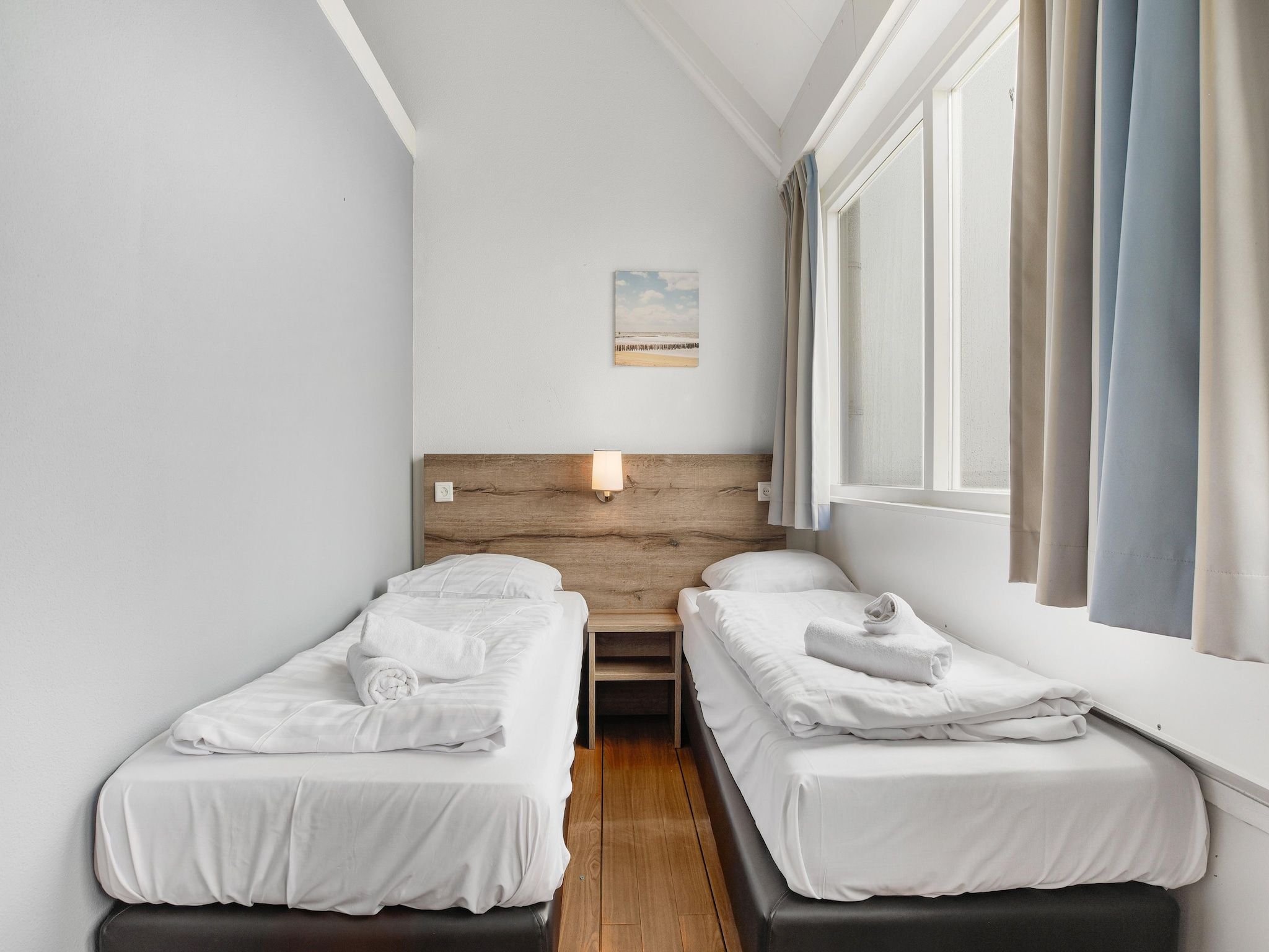 Een slaapkamer van Parc Port Greve 15 in Brouwershaven