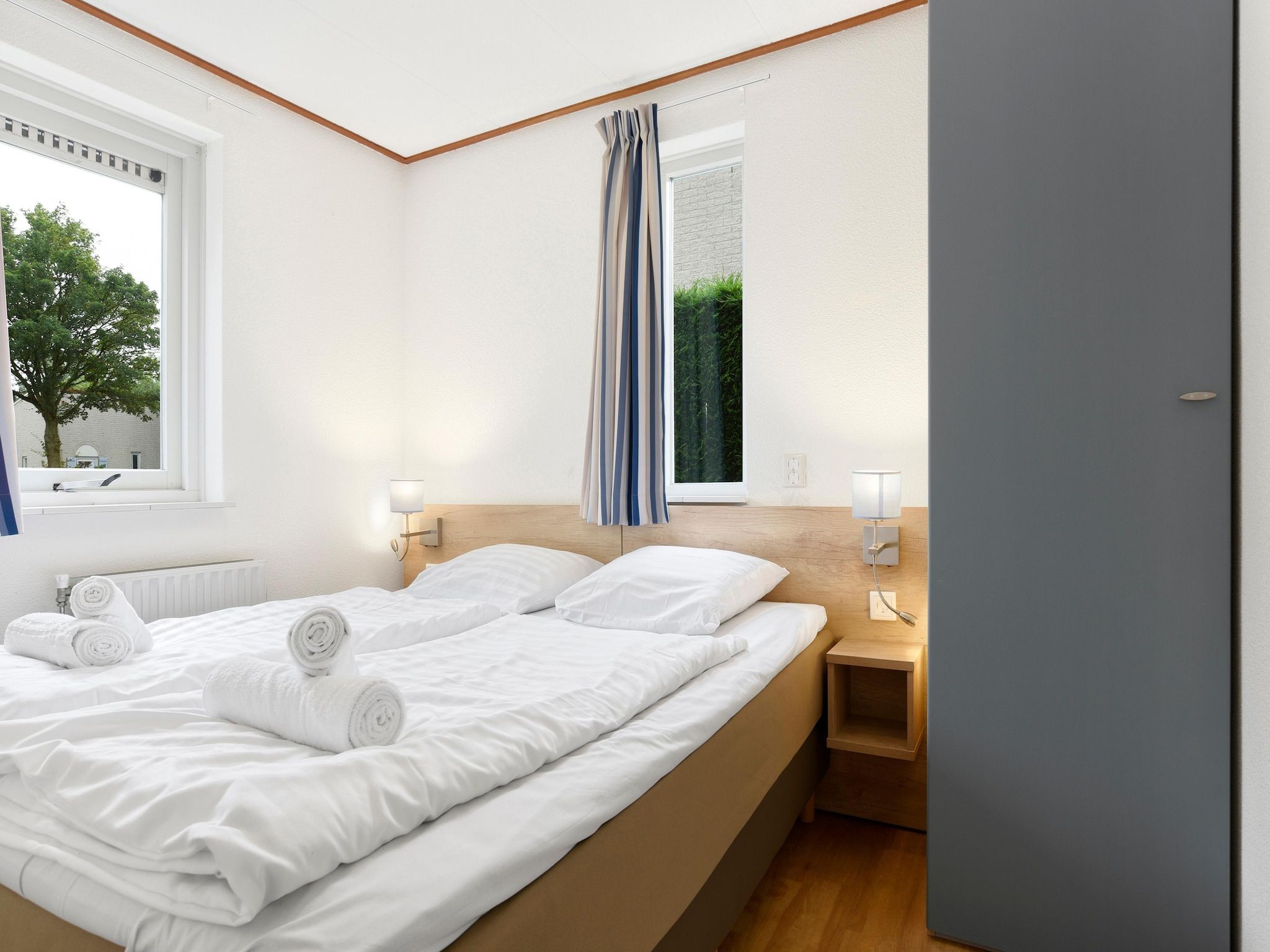 Een slaapkamer van Parc Port Greve 18 in Brouwershaven