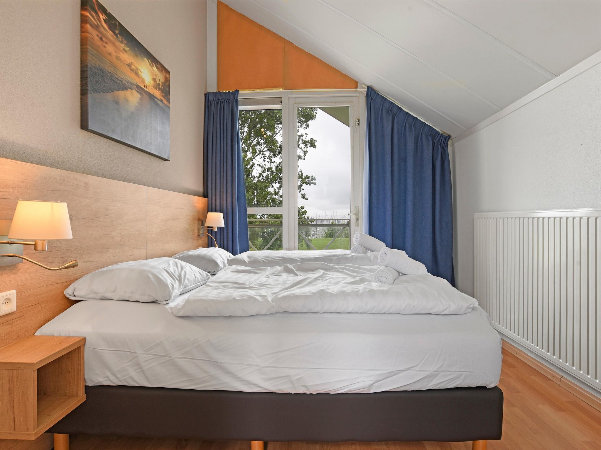Een slaapkamer van Parc Port Greve 20 in Brouwershaven