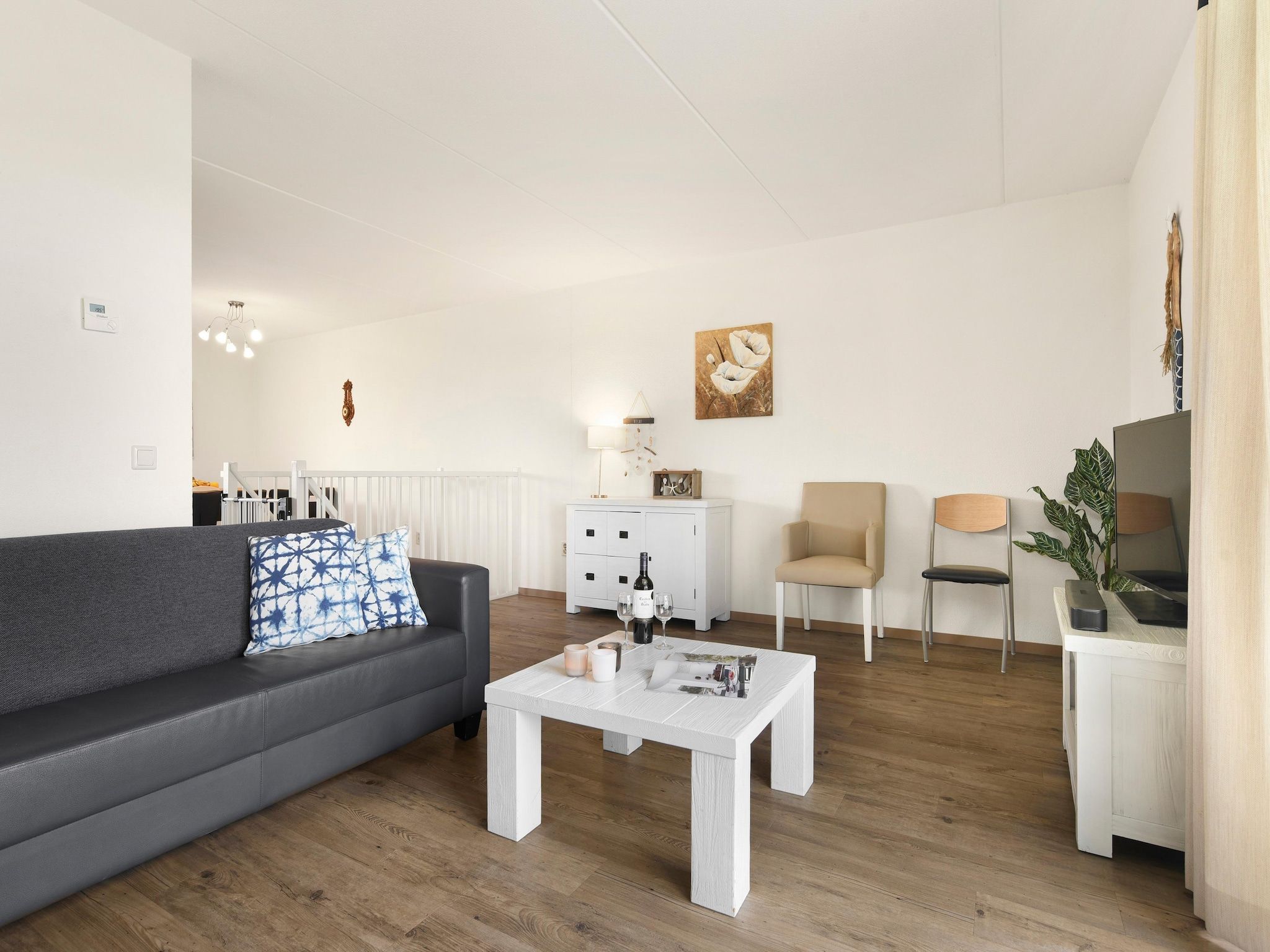 De woonkamer van Parc Port Greve 21 in Brouwershaven