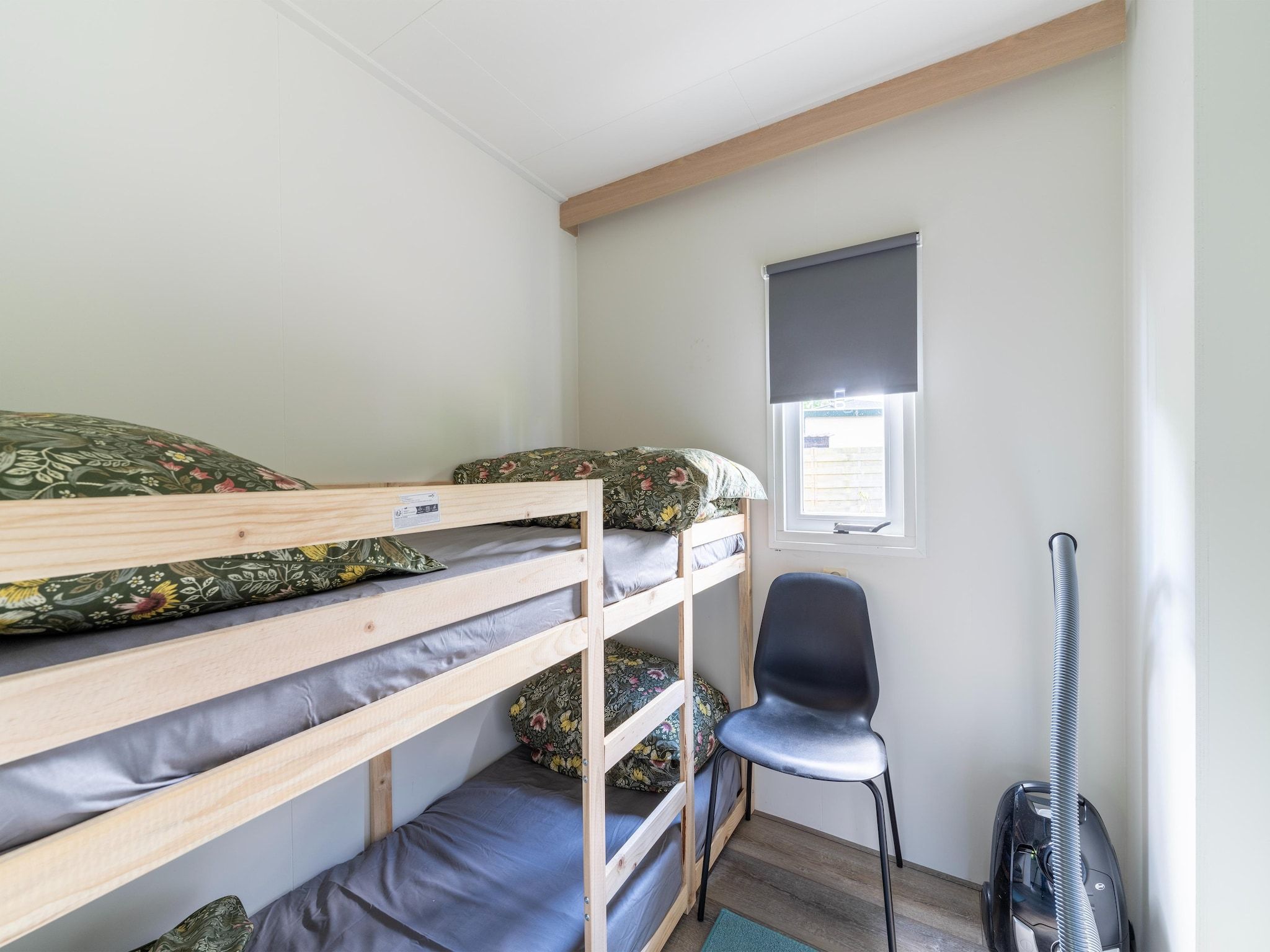 Een slaapkamer van Huisje 60 Stegeren in Stegeren