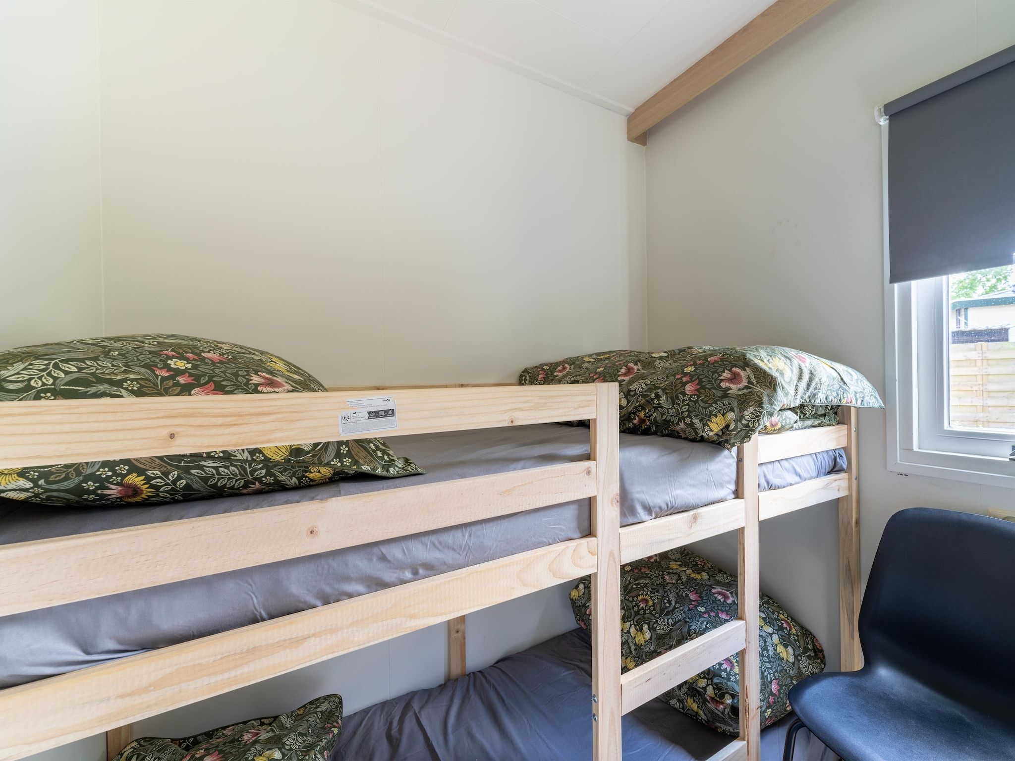 Een slaapkamer van Huisje 60 Stegeren in Stegeren