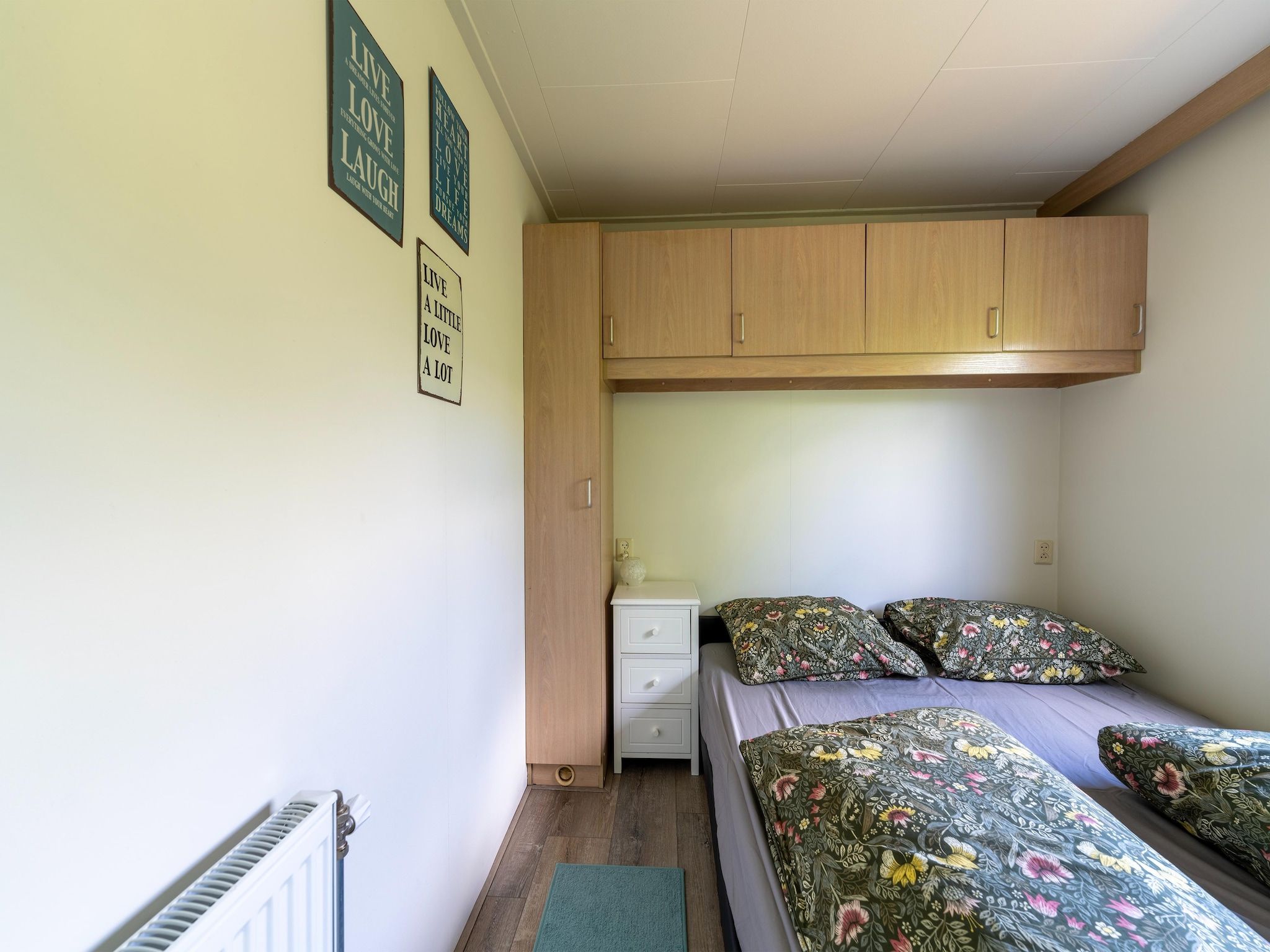 Een slaapkamer van Huisje 60 Stegeren in Stegeren