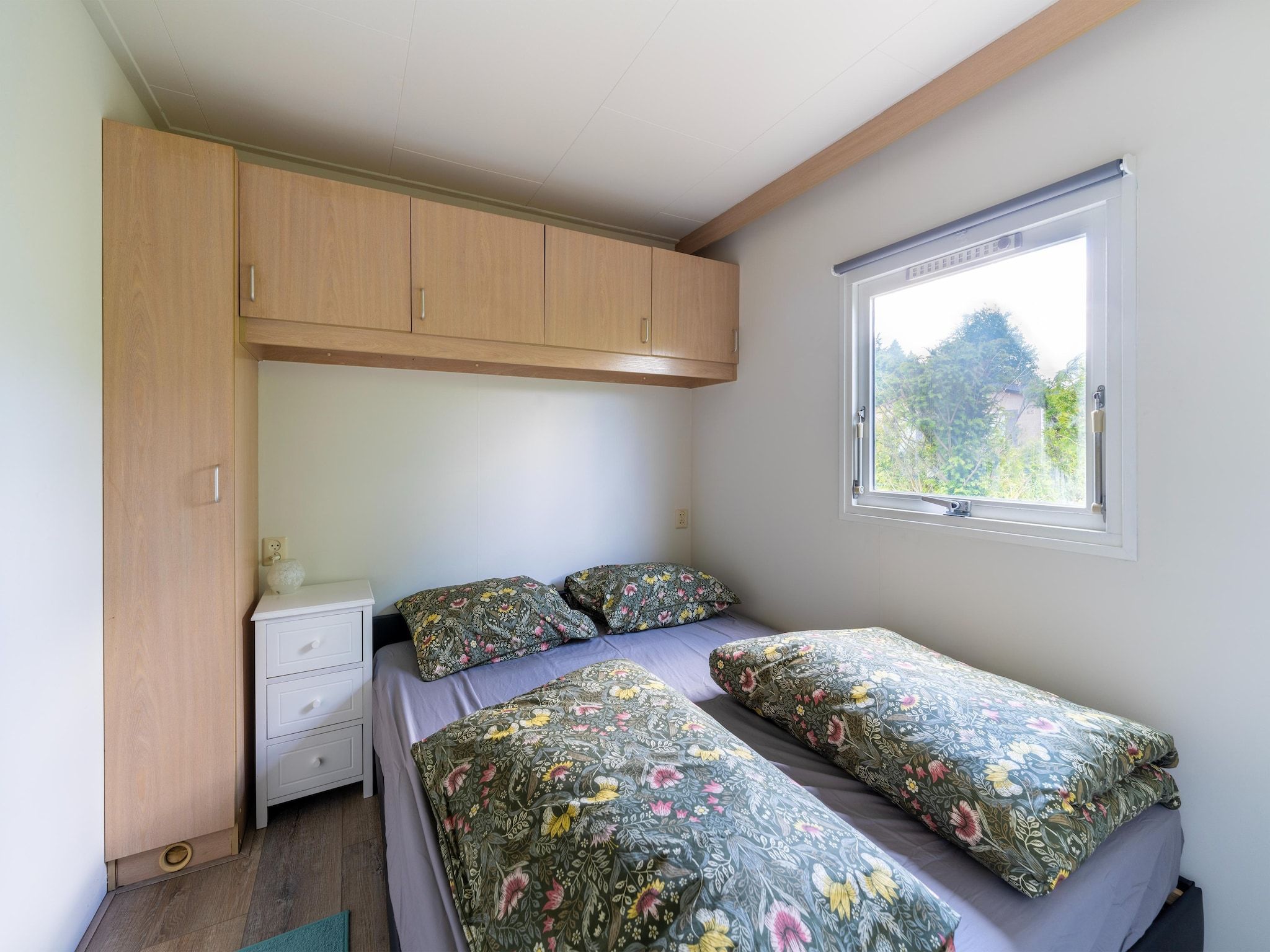 Een slaapkamer van Huisje 60 Stegeren in Stegeren