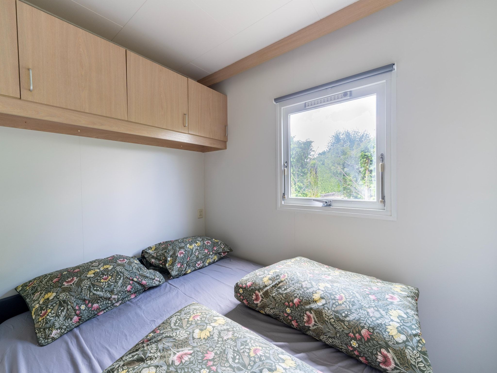 Een slaapkamer van Huisje 60 Stegeren in Stegeren