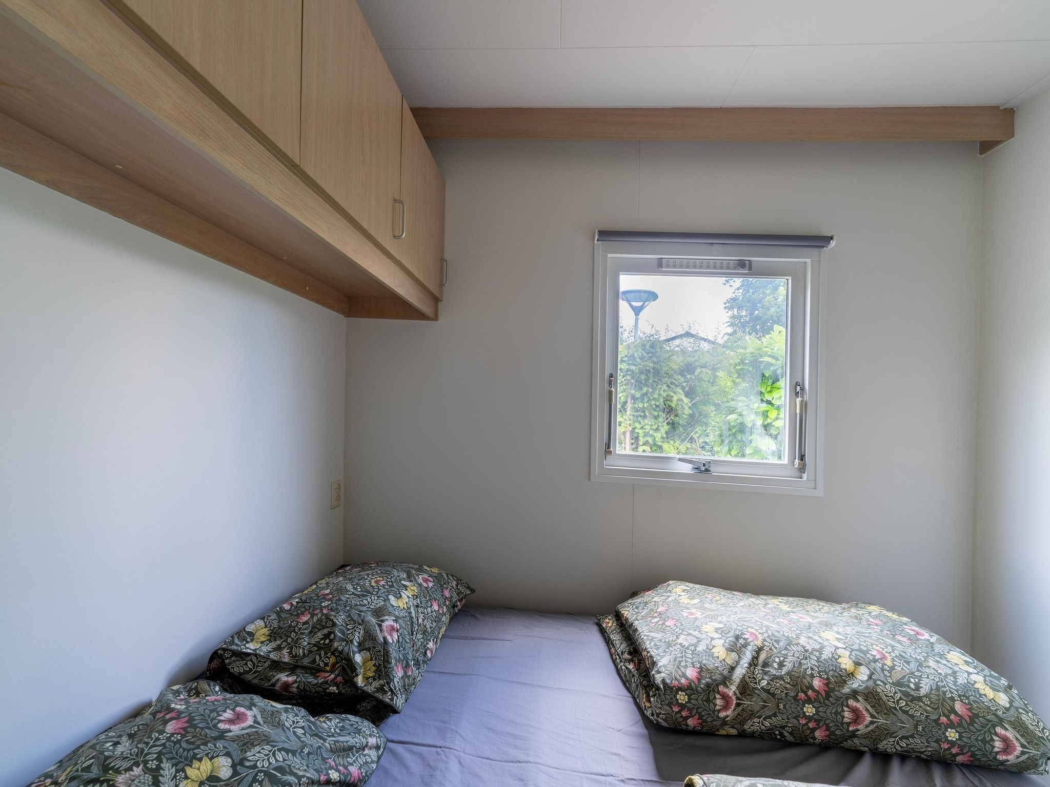 Een slaapkamer van Huisje 60 Stegeren in Stegeren