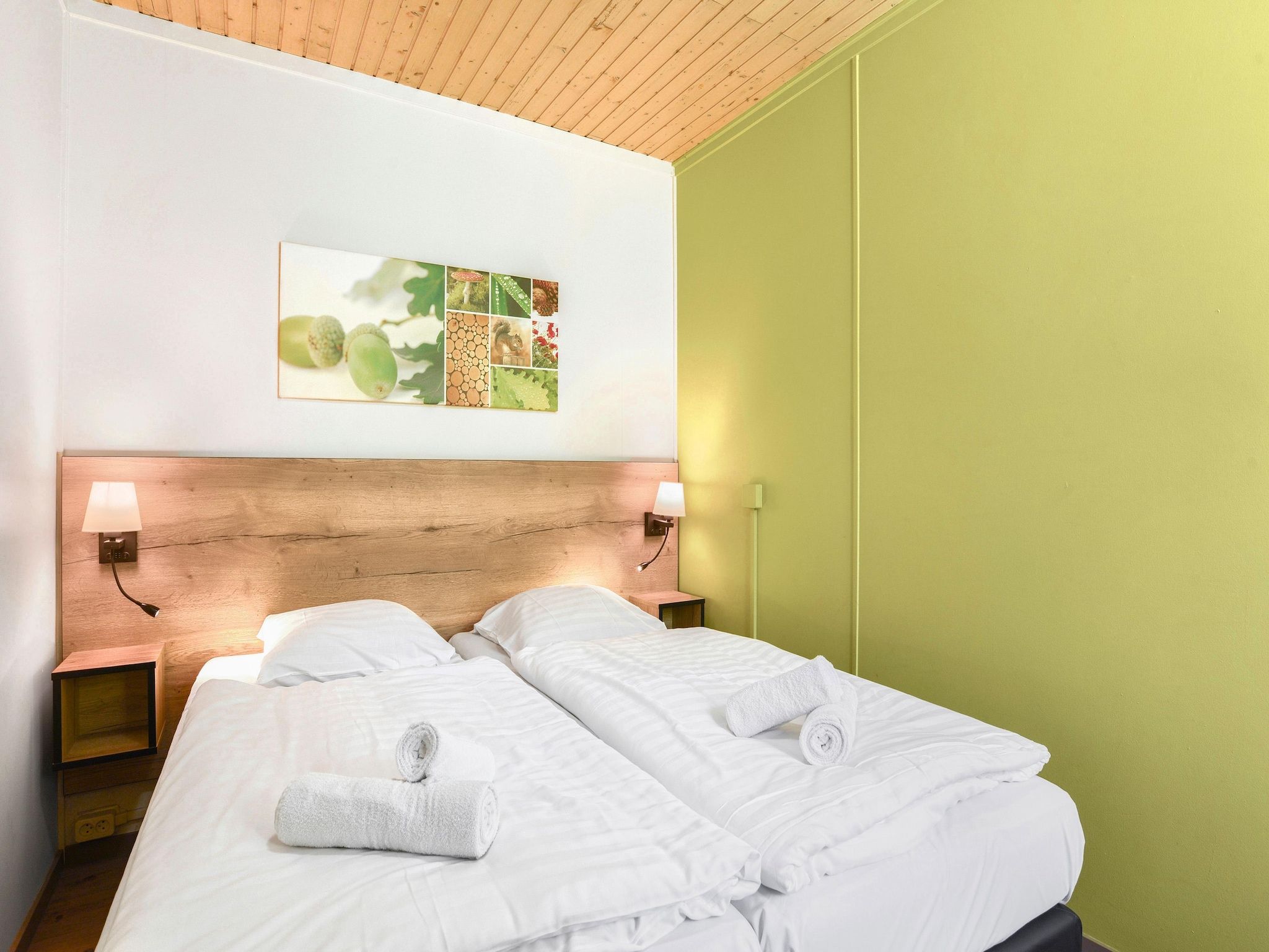 Een slaapkamer van Parc Heihaas 3 in Putten