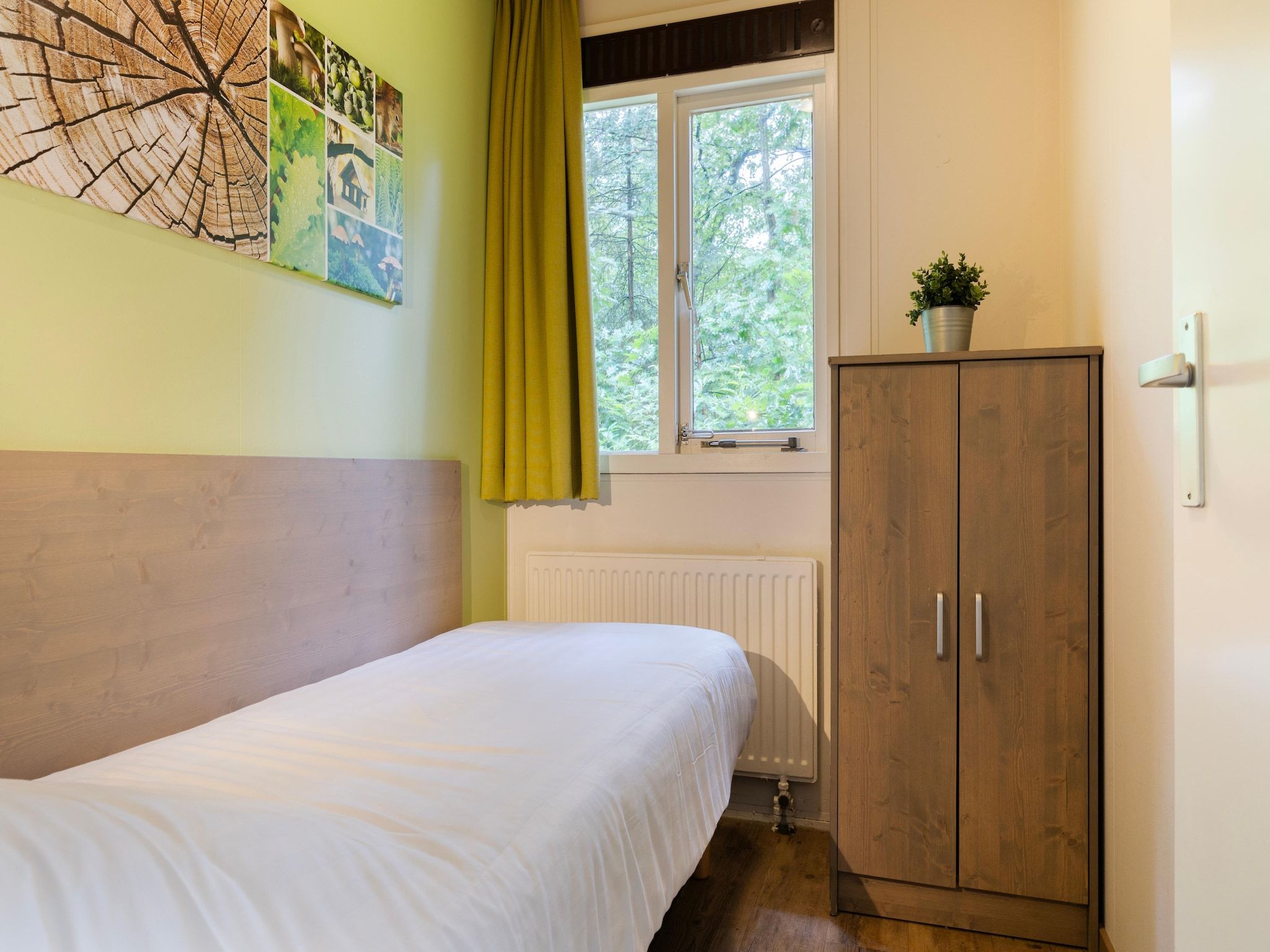 Een slaapkamer van Parc Heihaas 5 in Putten