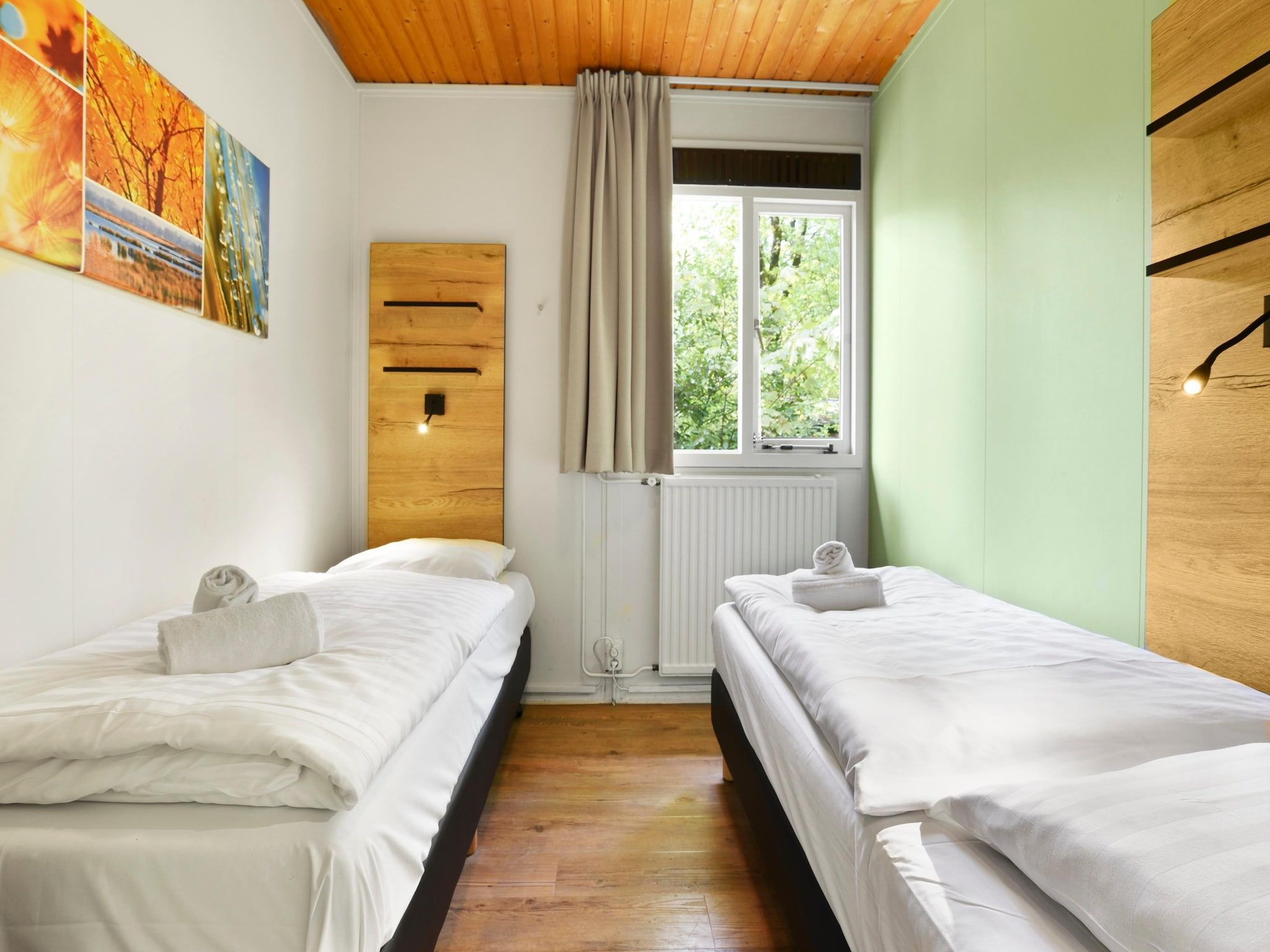 Een slaapkamer van Parc Heihaas 9 in Putten