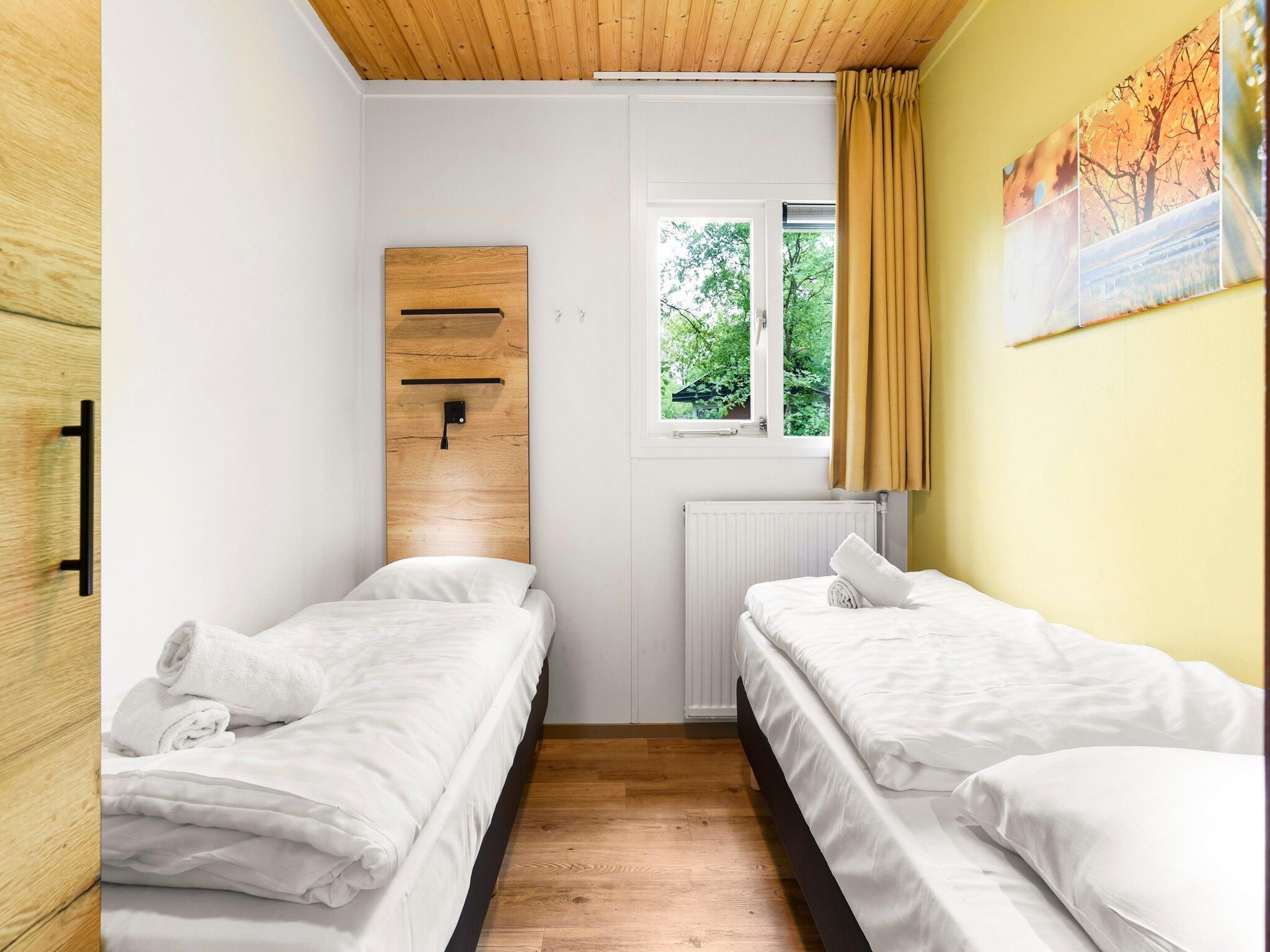 Een slaapkamer van Parc Heihaas 10 in Putten