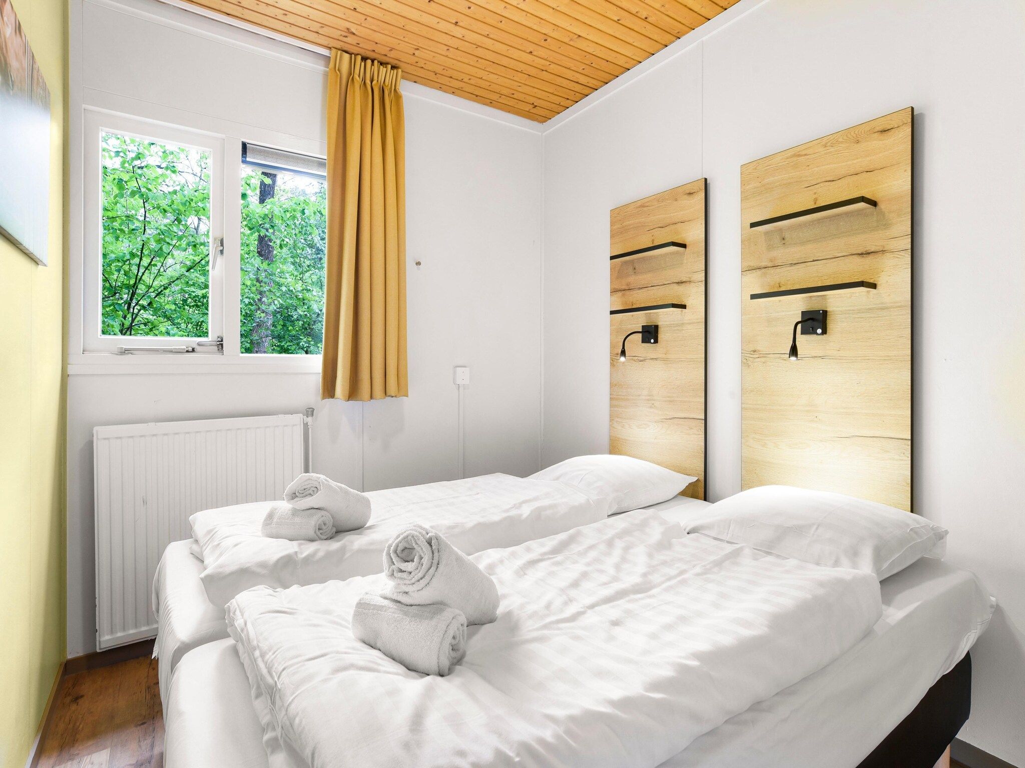 Een slaapkamer van Parc Heihaas 10 in Putten