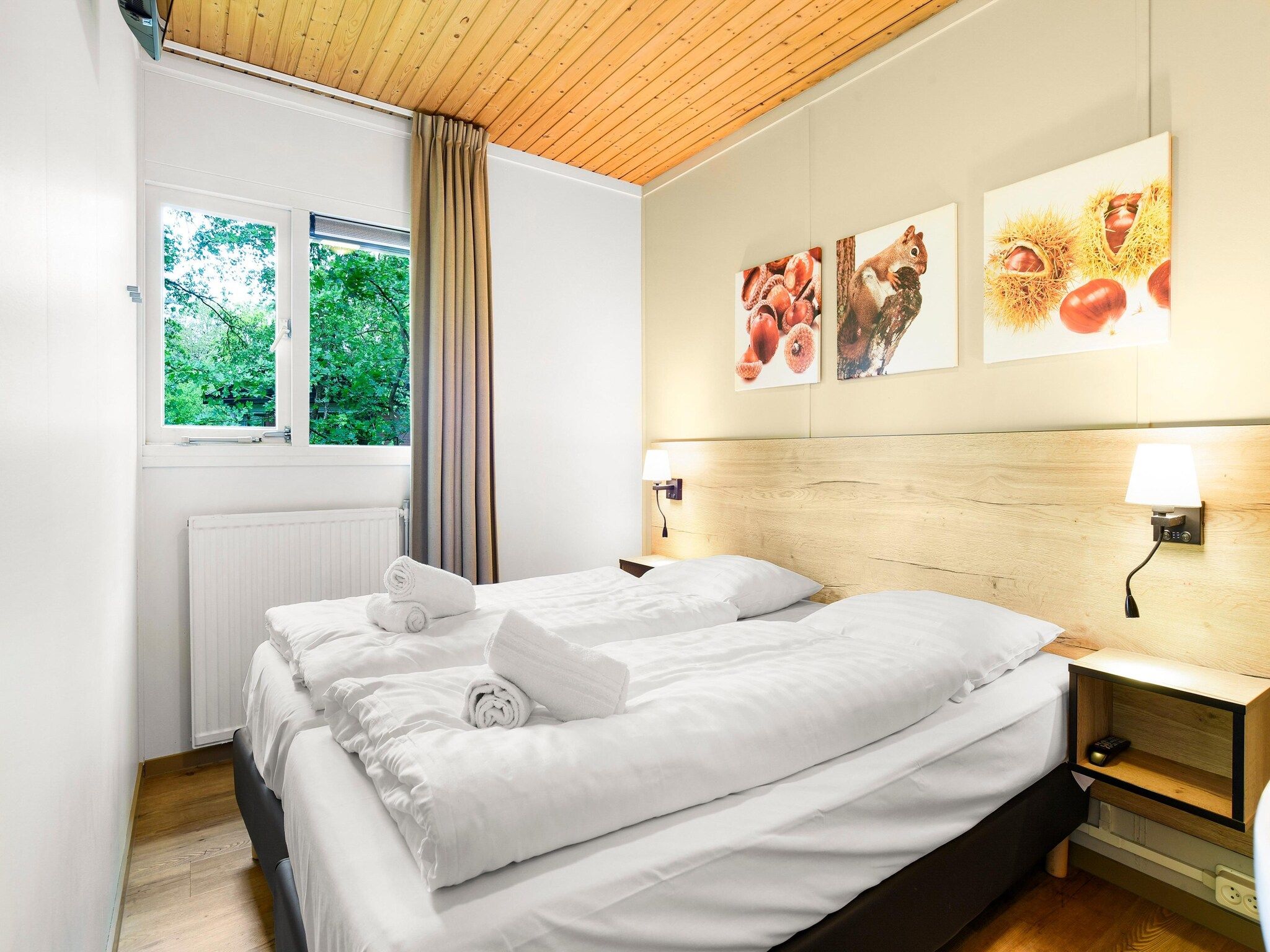 Een slaapkamer van Parc Heihaas 10 in Putten