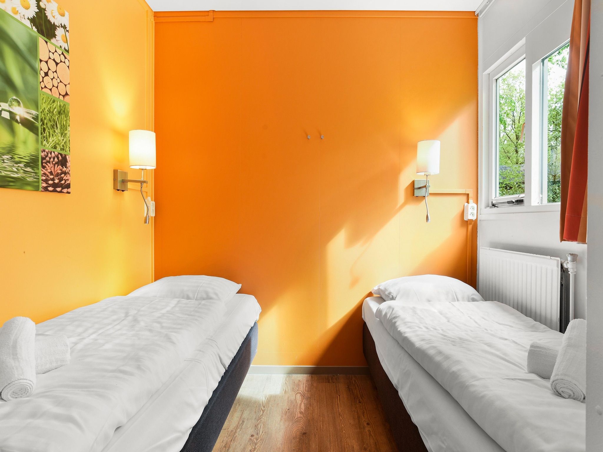 Een slaapkamer van Parc Heihaas 12 in Putten