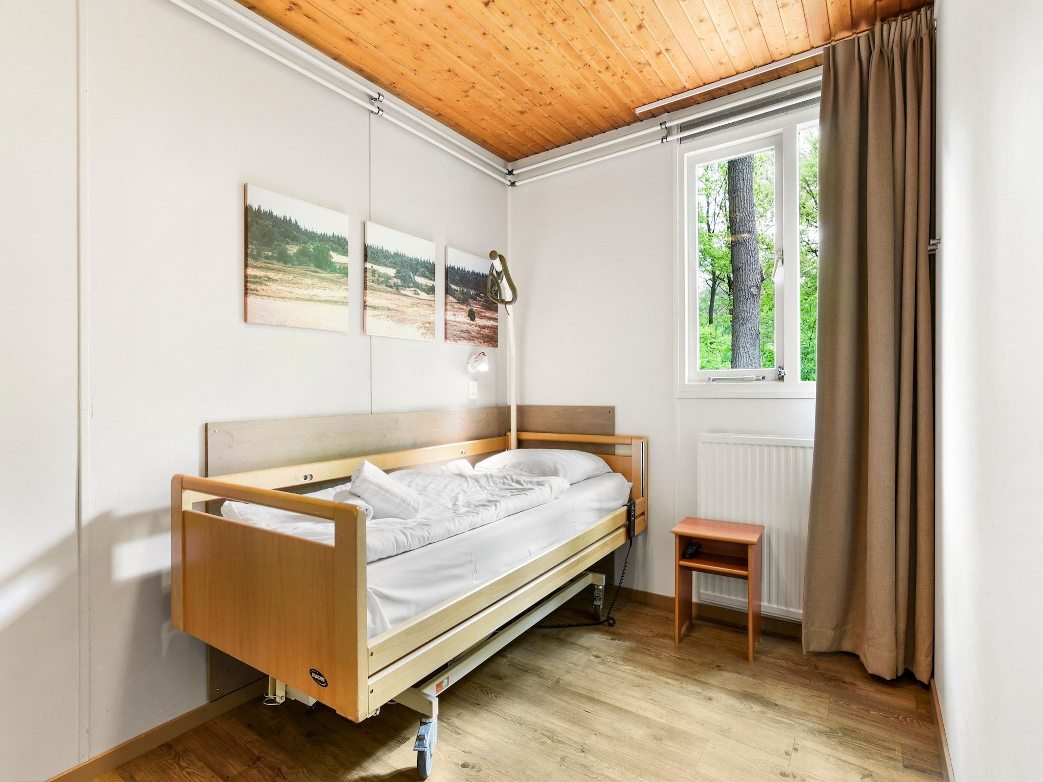 Een slaapkamer van Parc Heihaas 13 in Putten