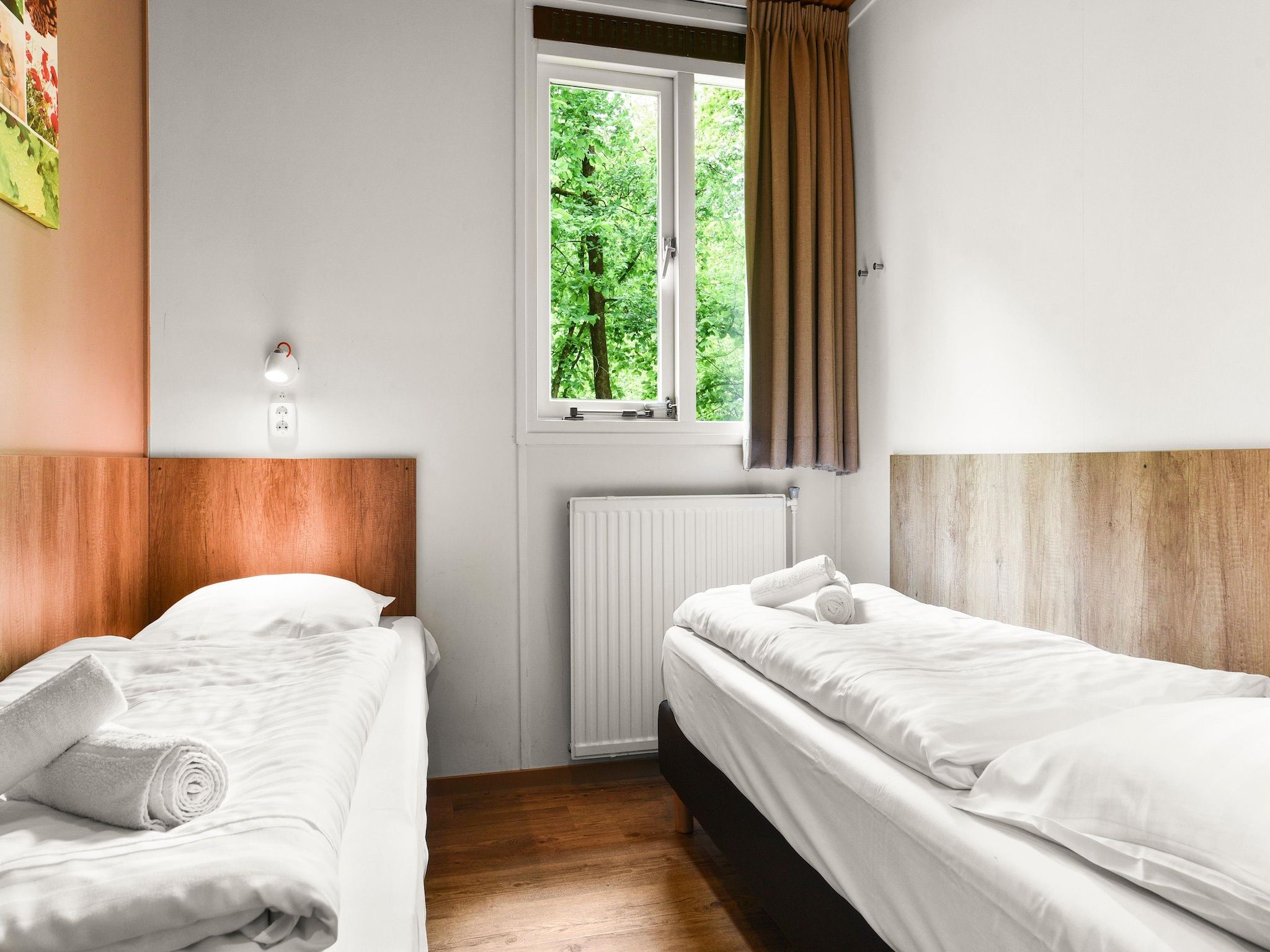 Een slaapkamer van Parc Heihaas 15 in Putten