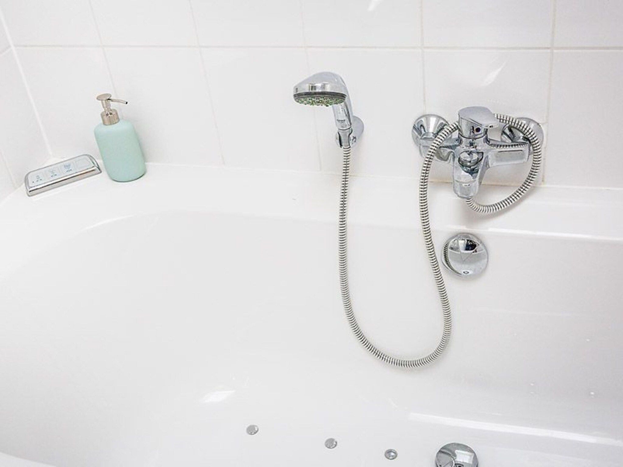 De badkamer van Golfvilla 38 comfort in Hollum