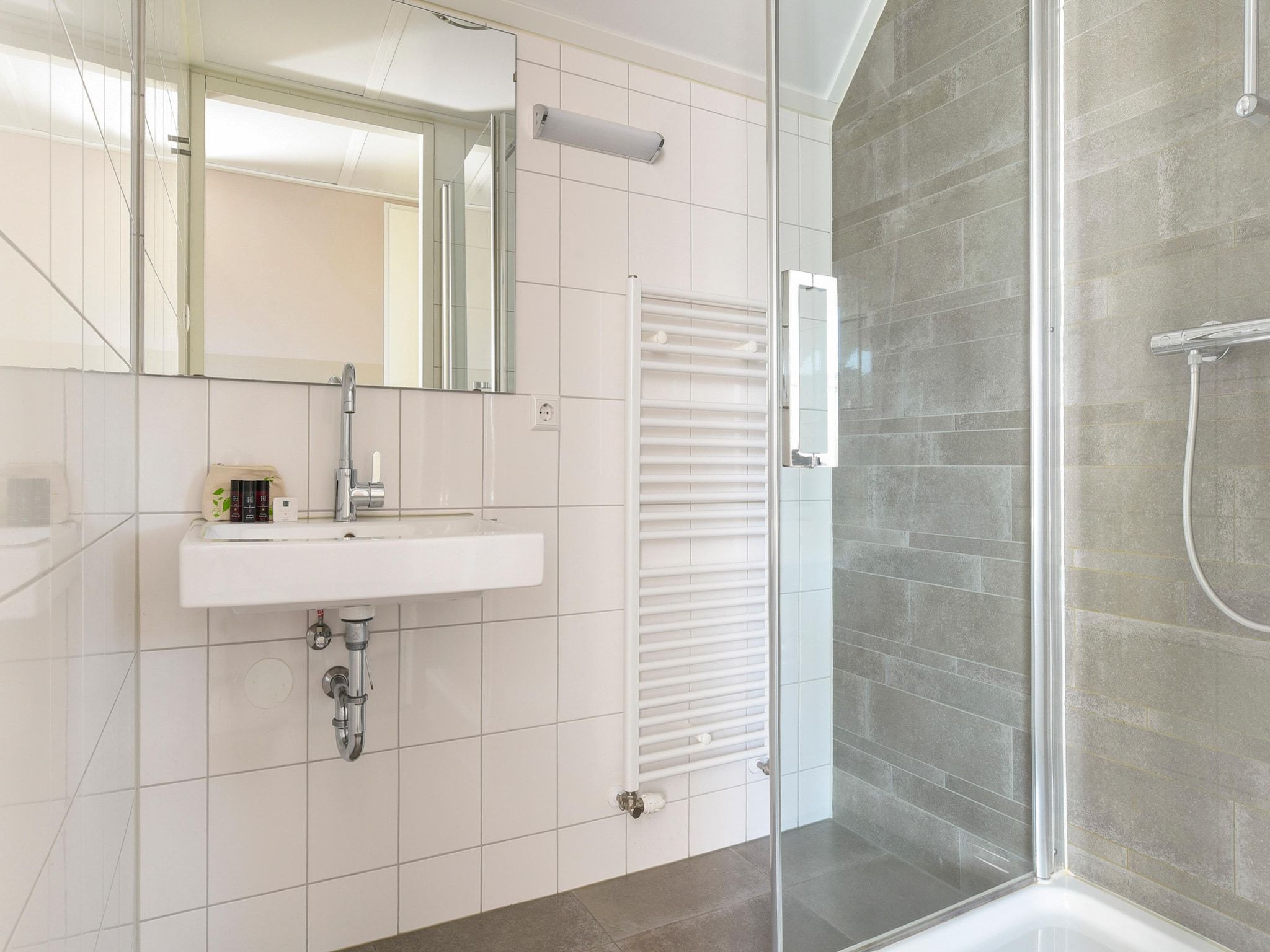 De badkamer van Strand Resort Nieuwvliet-Bad 4 in Nieuwvliet