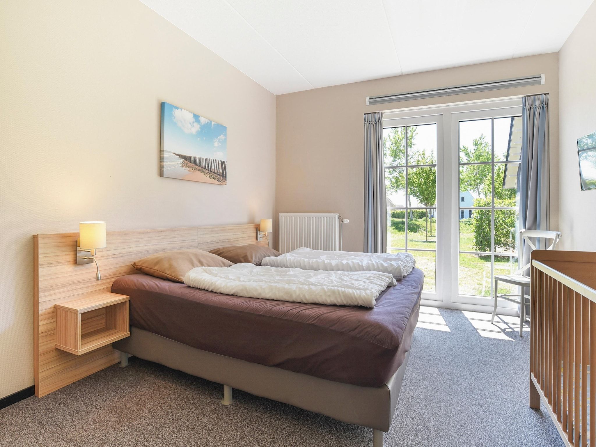 Een slaapkamer van Strand Resort Nieuwvliet-Bad 4 in Nieuwvliet