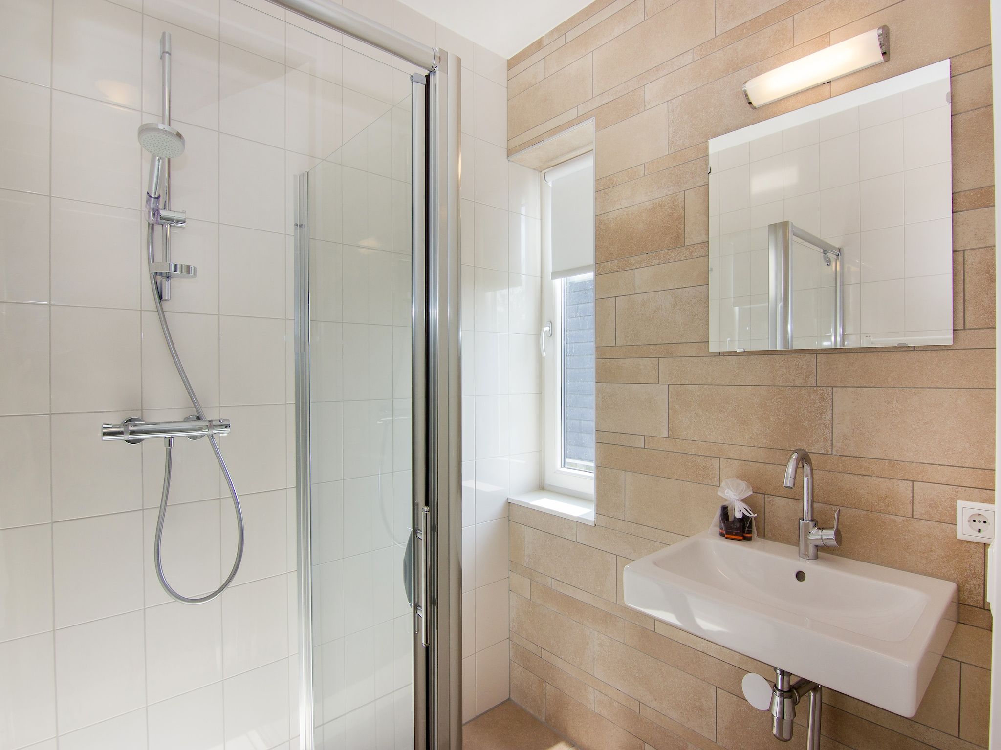 De badkamer van Strand Resort Nieuwvliet-Bad 5 in Nieuwvliet