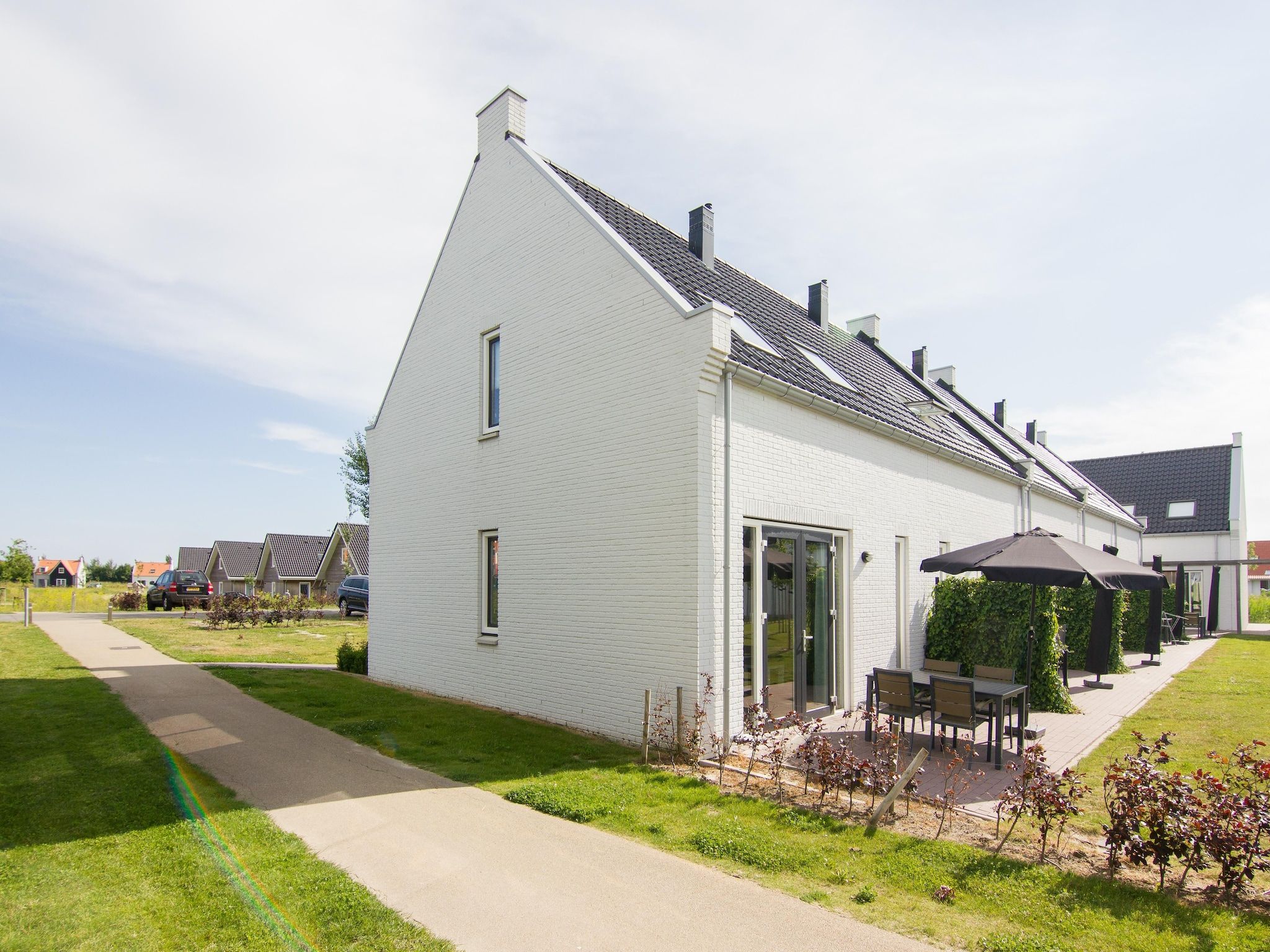 Het terras van Strand Resort Nieuwvliet-Bad 5 in Nieuwvliet