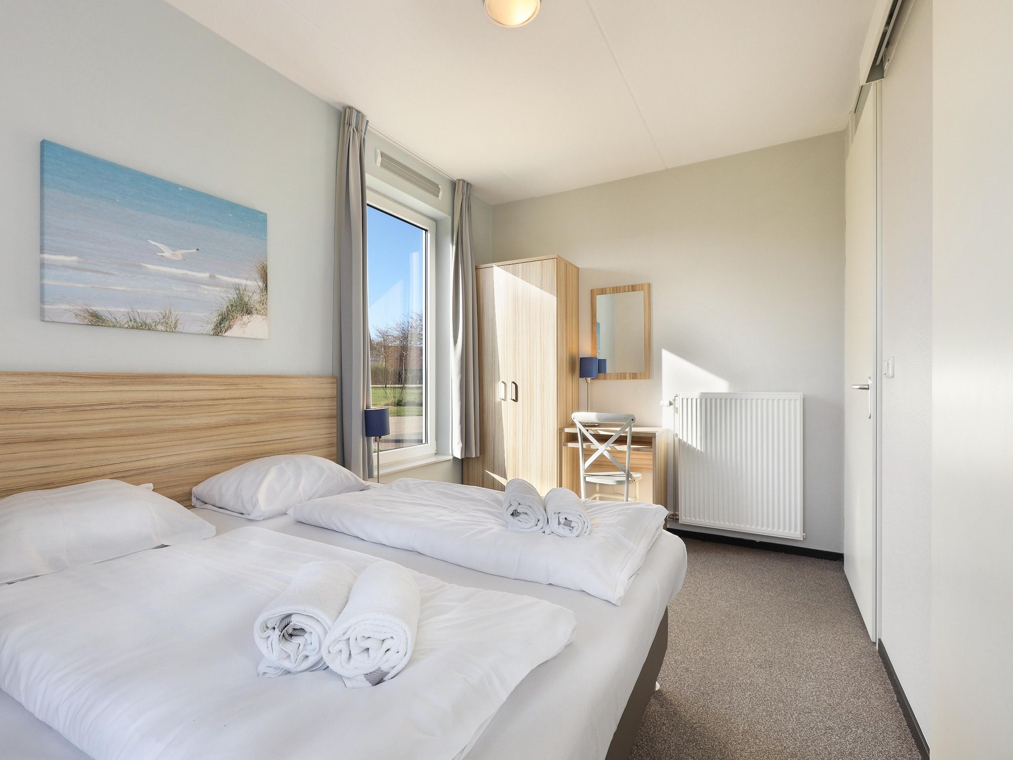 Een slaapkamer van Strand Resort Nieuwvliet-Bad 8 in Nieuwvliet