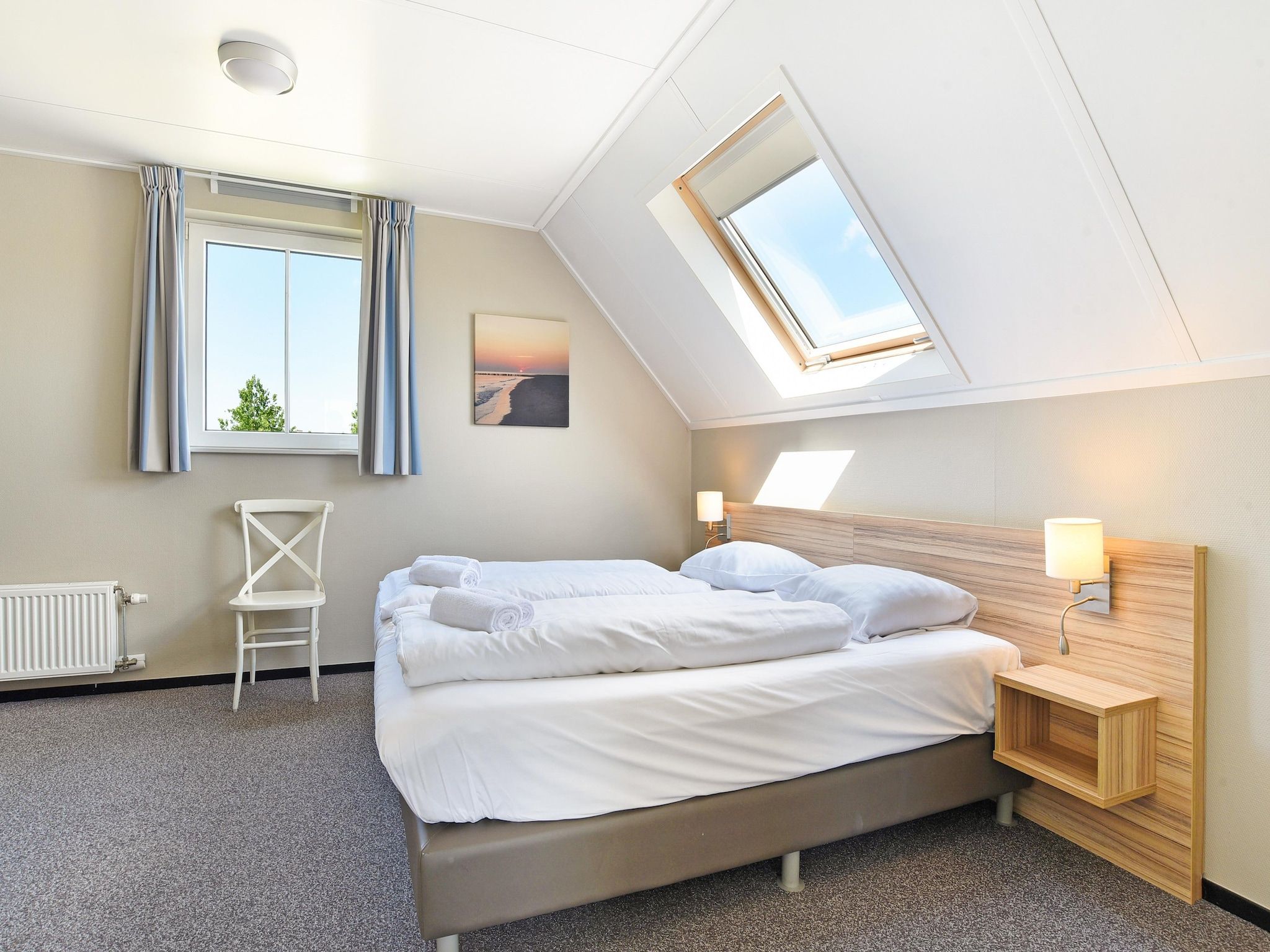 Een slaapkamer van Strand Resort Nieuwvliet-Bad 10 in Nieuwvliet