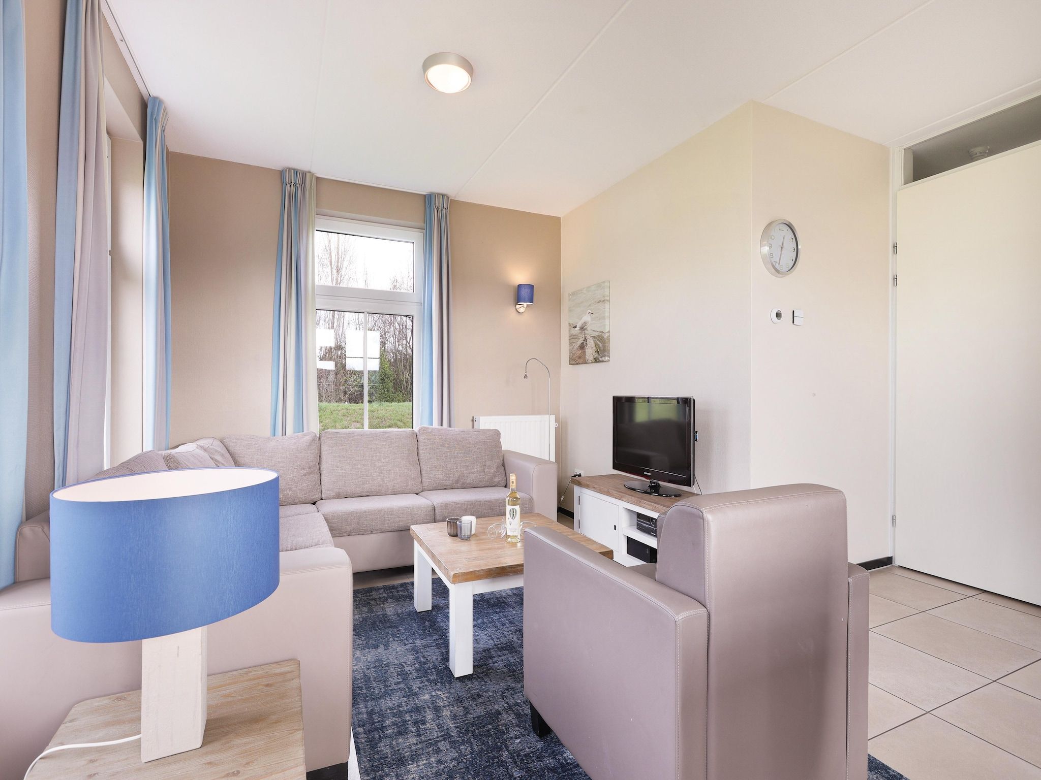 De woonkamer van Strand Resort Nieuwvliet-Bad 11 in Nieuwvliet